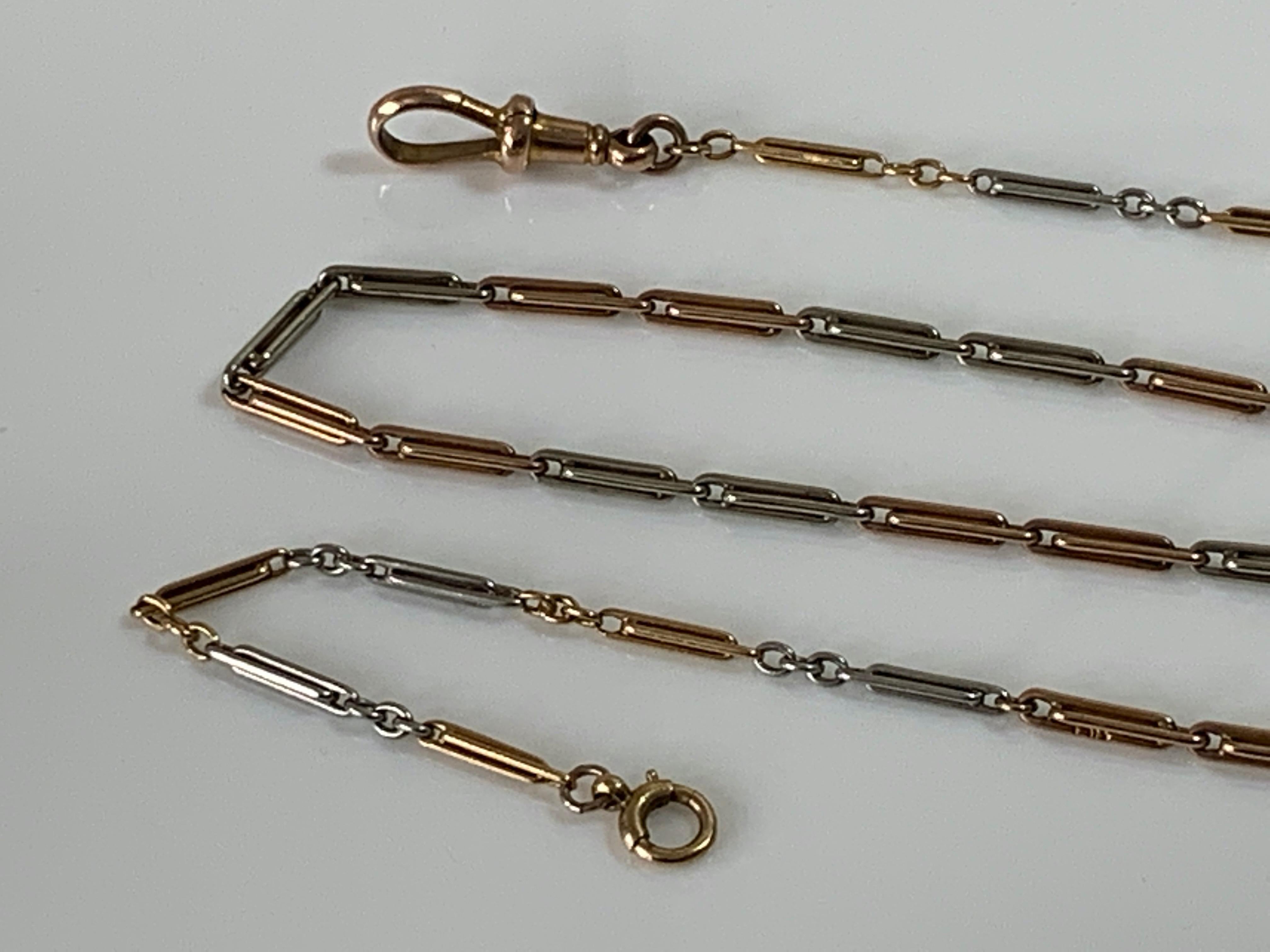 Antique Edwardian 18ct Gold & Platinum Chain 
The last three 18ct gold links on each end are yellow 18ct Gold 
all the rest are 18ct Rose Gold and Platinum
Two links are stamped with makers W.H ?
and other marks unidentifiable - please see