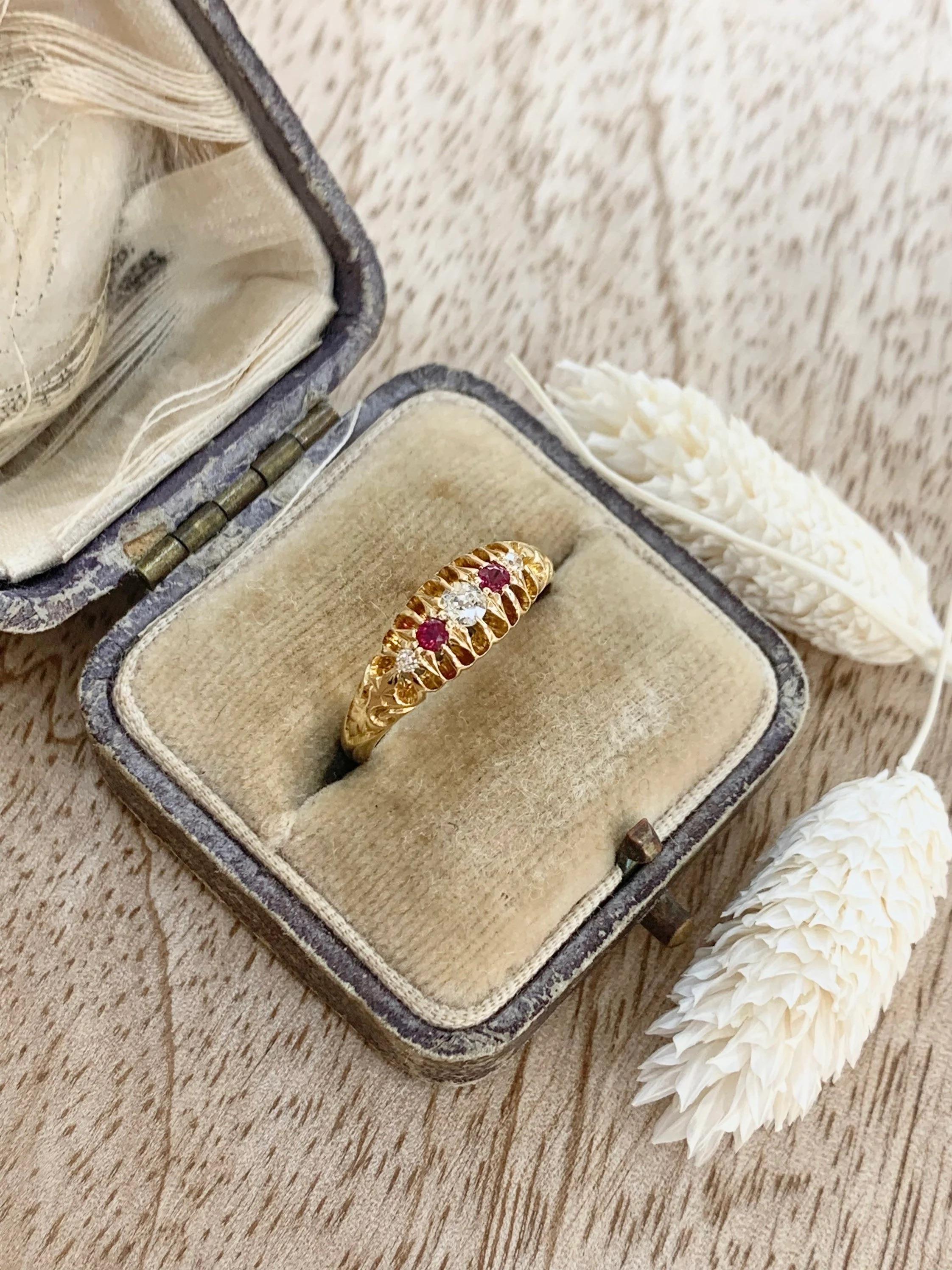 Ruby & Diamond Ring

18ct Gold 

Hallmarked Birmingham 1911

Makers Mark A B R Os

Set with Beautiful Diamonds & Rubies with Wonderful Hand Carved Shoulders 

UK Size K 1/2

US Size 5 3/4

Can be resized using our resizing service,
please contact us