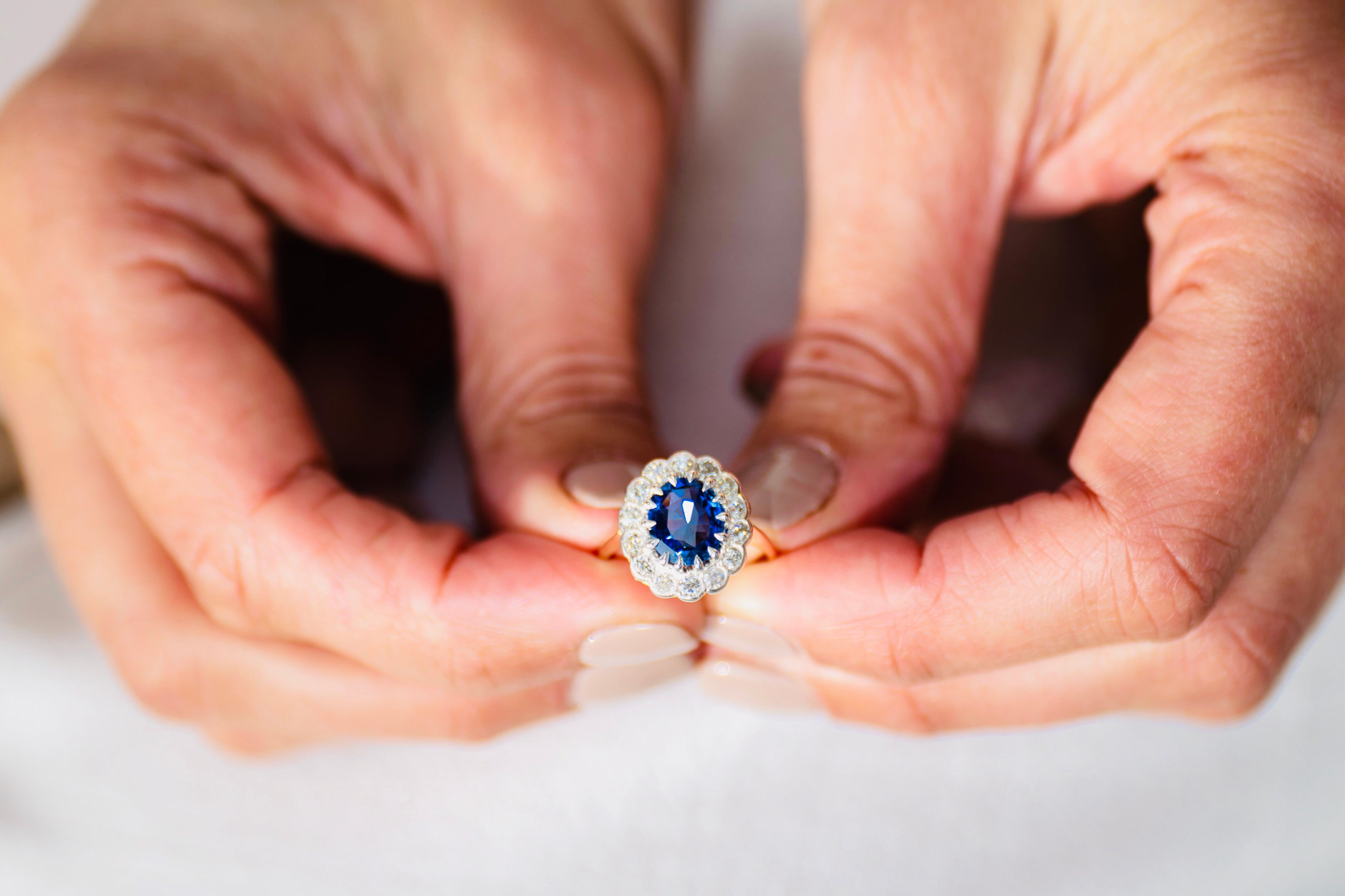 Oval Cut Vintage, 18 Carat Gold, Burmese Sapphire and Diamond Cluster Ring For Sale