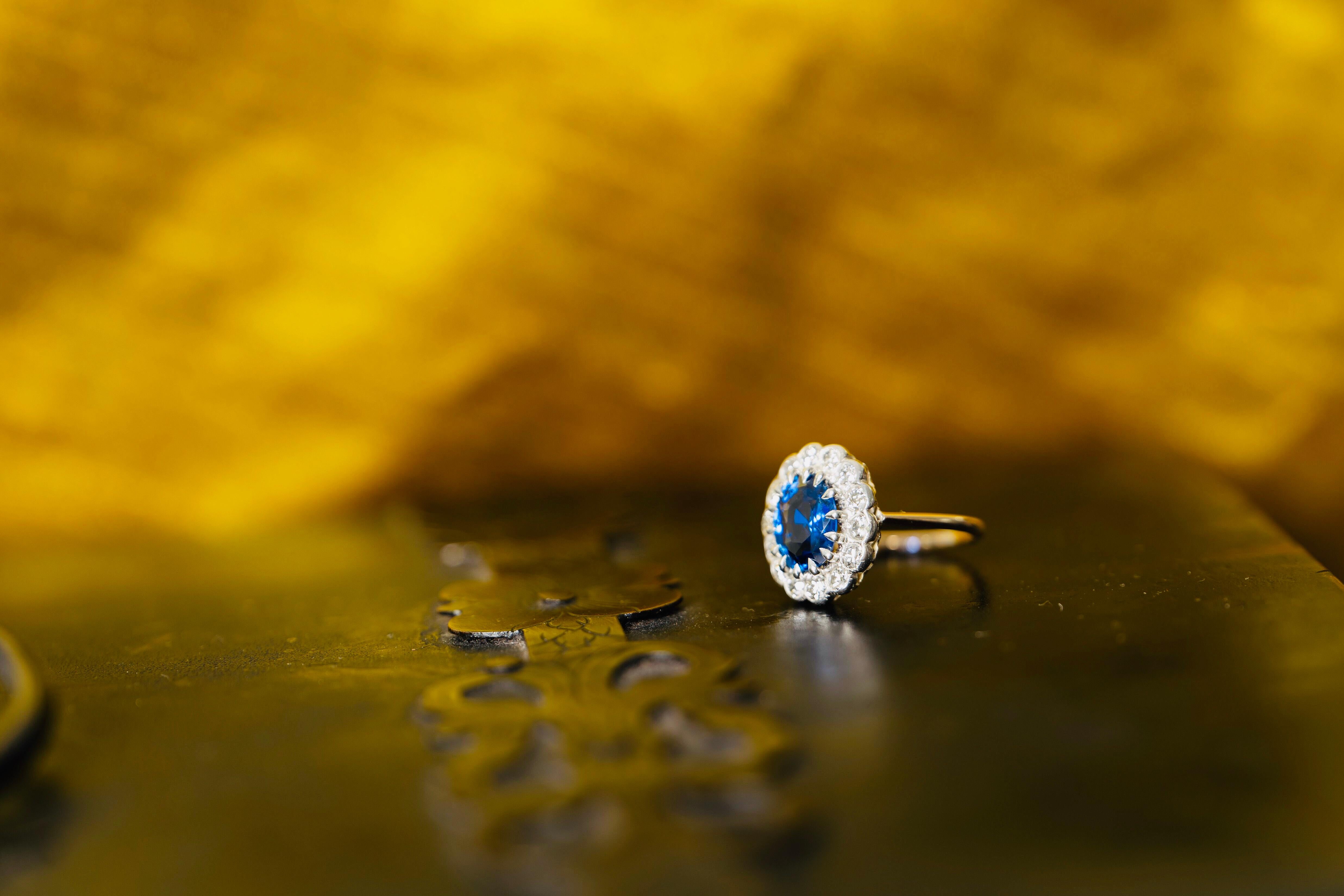 Vintage, 18 Carat Gold, Burmese Sapphire and Diamond Cluster Ring In Excellent Condition For Sale In Rochford, Essex