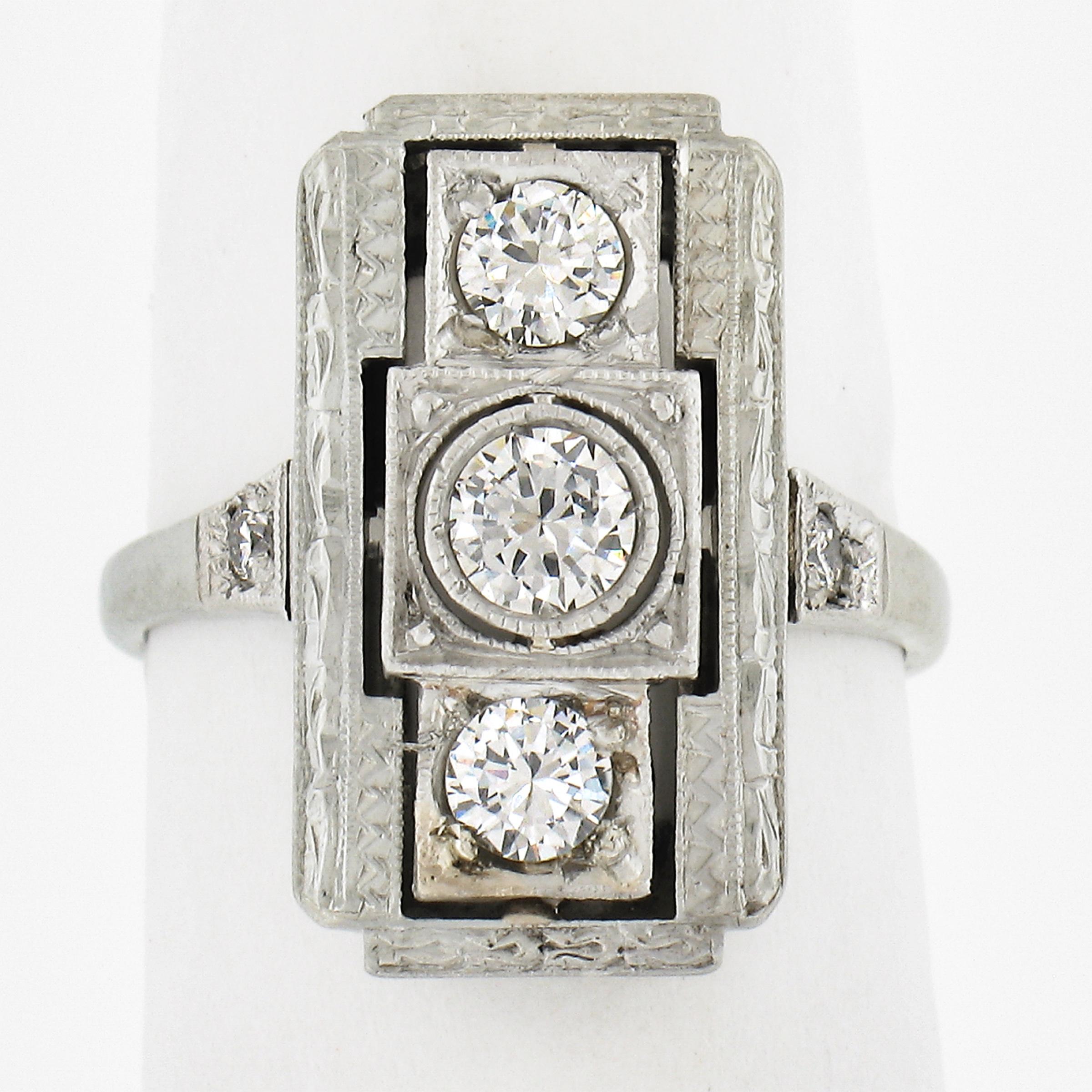 --Stone(s):--
(5) Natural Genuine Diamonds - Old Cut - Bezel & Pave Set - VS1/VS2 Clarity - G-I Color - 0.43ctw (approx.)

Material: Solid 18k White Gold
Weight: 3.76 Grams
Ring Size: 4.0 (Fitted on a finger. We can custom size this ring - Please