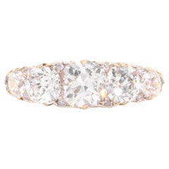 Antiguo anillo eduardiano de oro de 18 quilates y platino con 5 diamantes talla antigua de 2,47 quilates