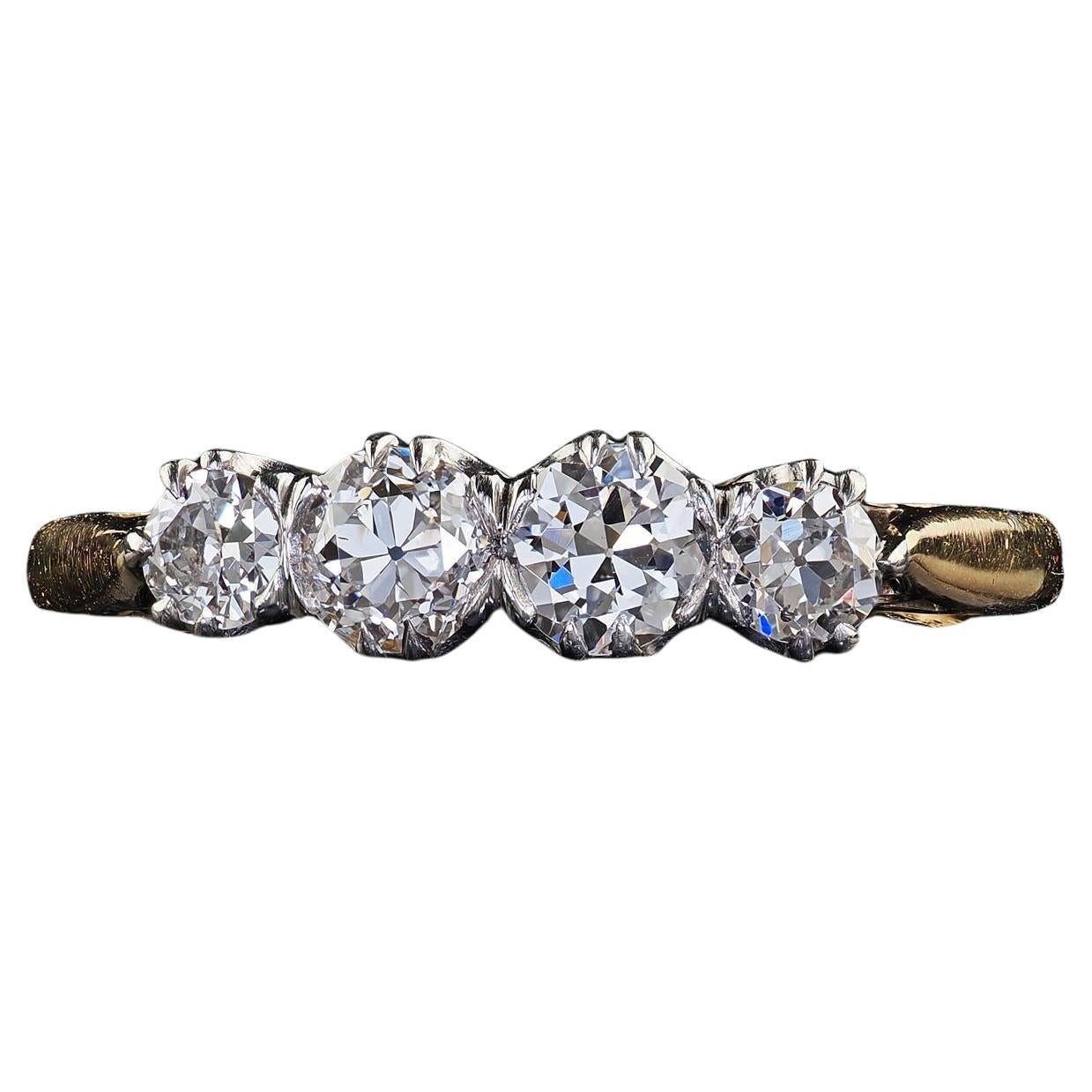 Antico anello edoardiano in oro 18 carati e platino Old Cut con quattro pietre di diamante in vendita