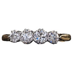 Antico anello edoardiano in oro 18 carati e platino Old Cut con quattro pietre di diamante