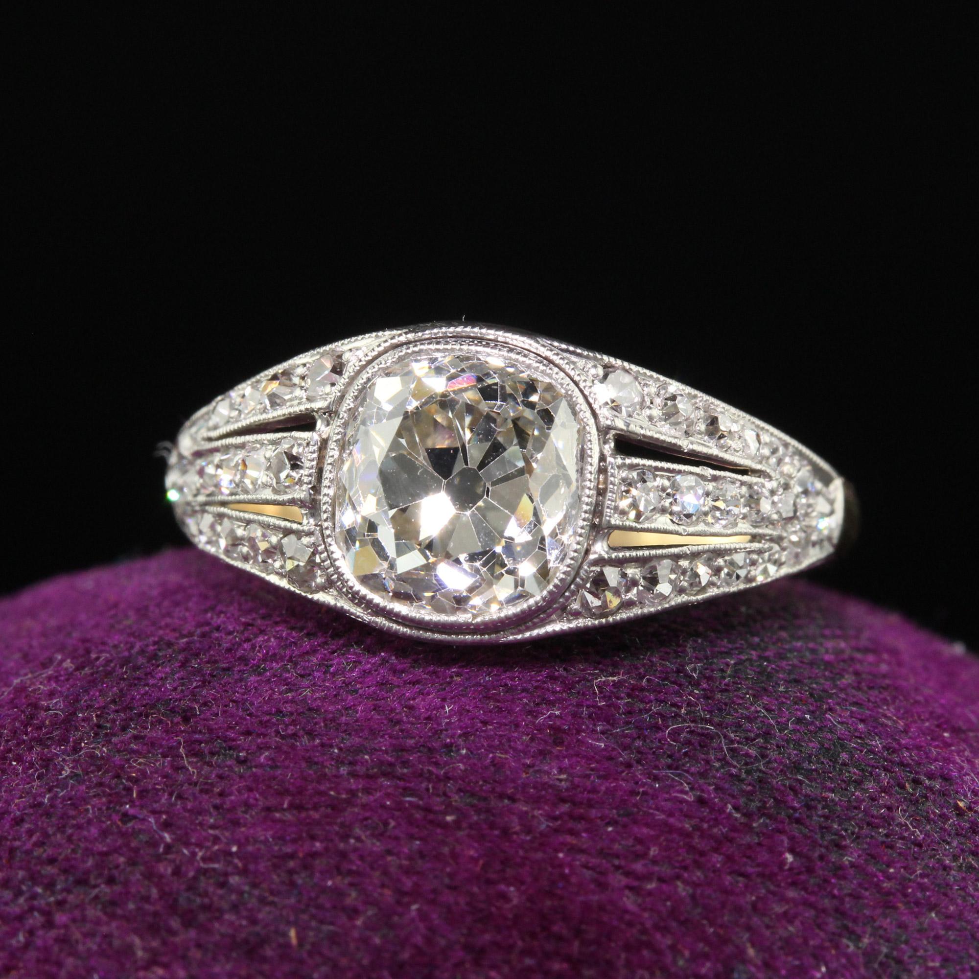 Beautiful Antique Edwardian 18K Gold Platinum Old Mine Diamond Engagement Ring - GIA. This incredible engagement ring is crafted in 18k yellow gold and platinum. The center holds a gorgeous old mine cut diamond that has a GIA report. The side