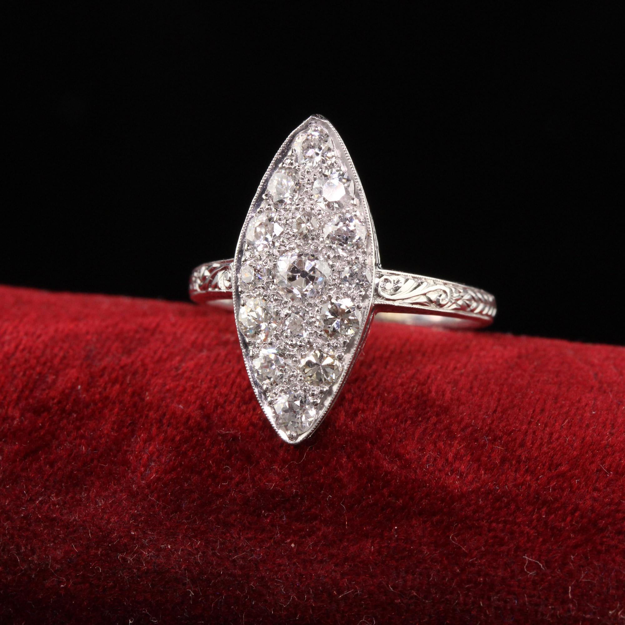 Beautiful Antique Edwardian 18K White Gold Platinum Top Old Euro Diamond Navette Ring. This beautiful ring is crafted in 18k white gold and platinum. The ring has old european diamonds set on the top in platinum and the shank and bottom gallery is