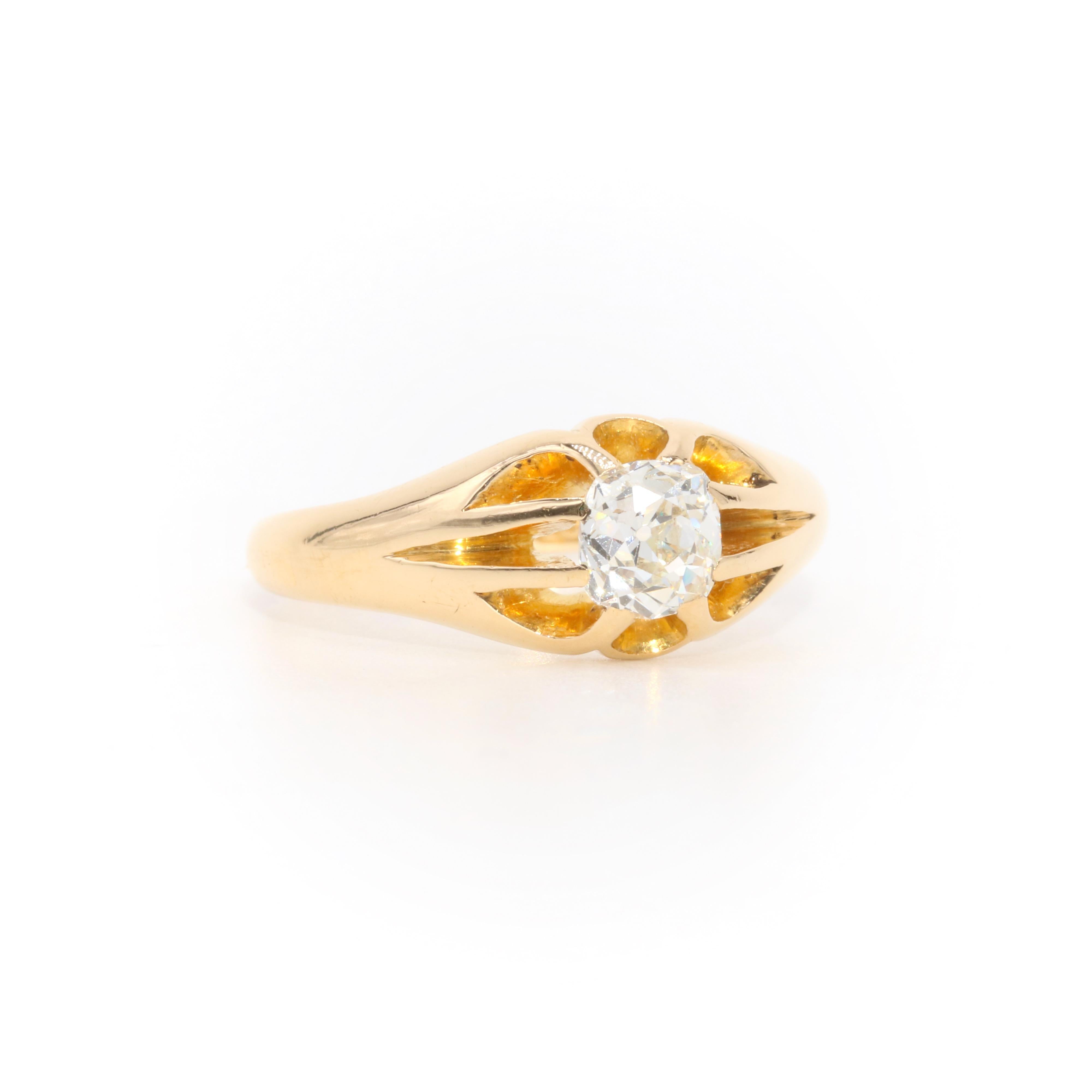 An antique diamond and yellow gold ring, comprising one large old mine cut diamond, set in 18 karat yellow gold, to a band of 18 karat yellow gold. 

This striking ring is set to the centre with a large old mine cut diamond. The diamond is