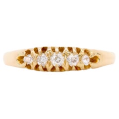 Antiguo anillo eduardiano de oro amarillo de 18 quilates con 5 diamantes