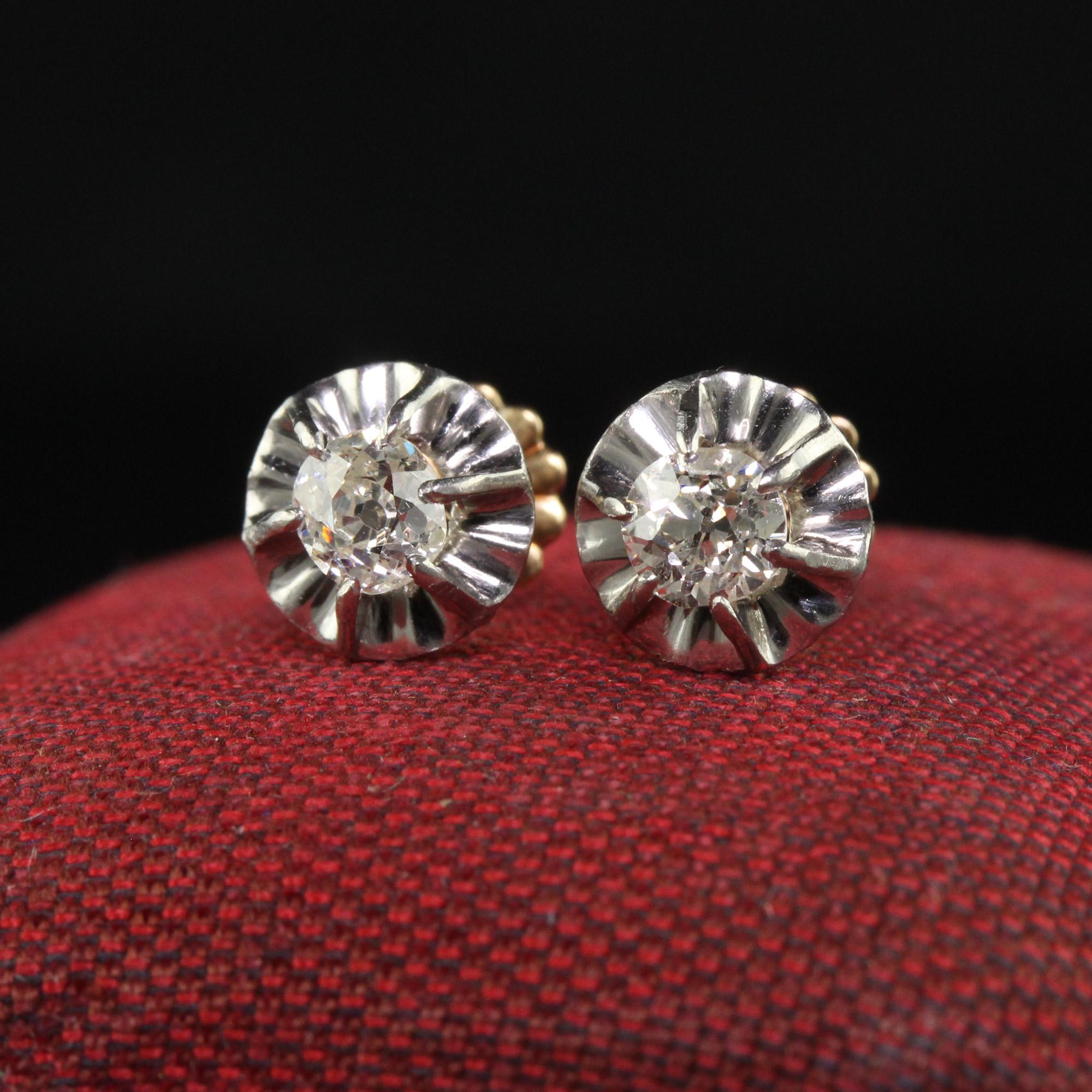 Beautiful Antique Edwardian 18K Yellow Gold and Platinum Old Mine Diamond Stud Earrings. This gorgeous pair of old mine diamond earrings are crafted in 18k yellow gold and platinum. The studs are set with chunky old mine cut diamonds. The setting is