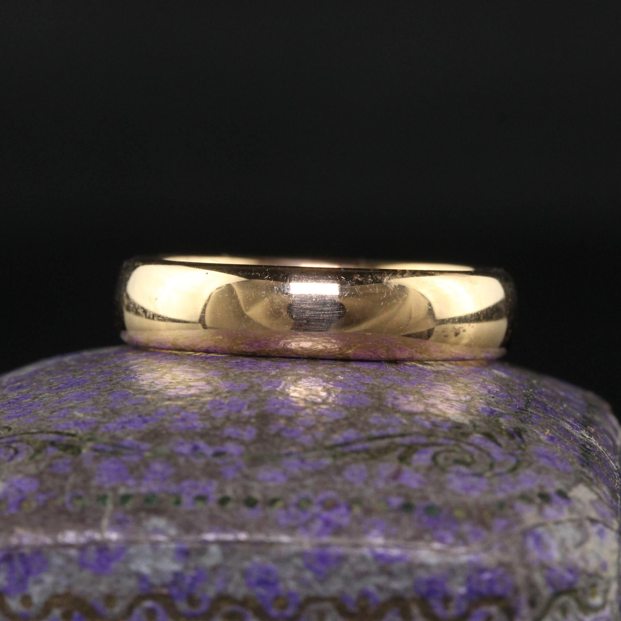 Beautiful Antique Edwardian 18K Yellow Gold Classic Engraved Wedding Band - Size 6 3/4. This beautiful Edwardian wedding band is crafted in 18k yellow gold. The ring features a classic polished design that goes around the entire ring. The inside of
