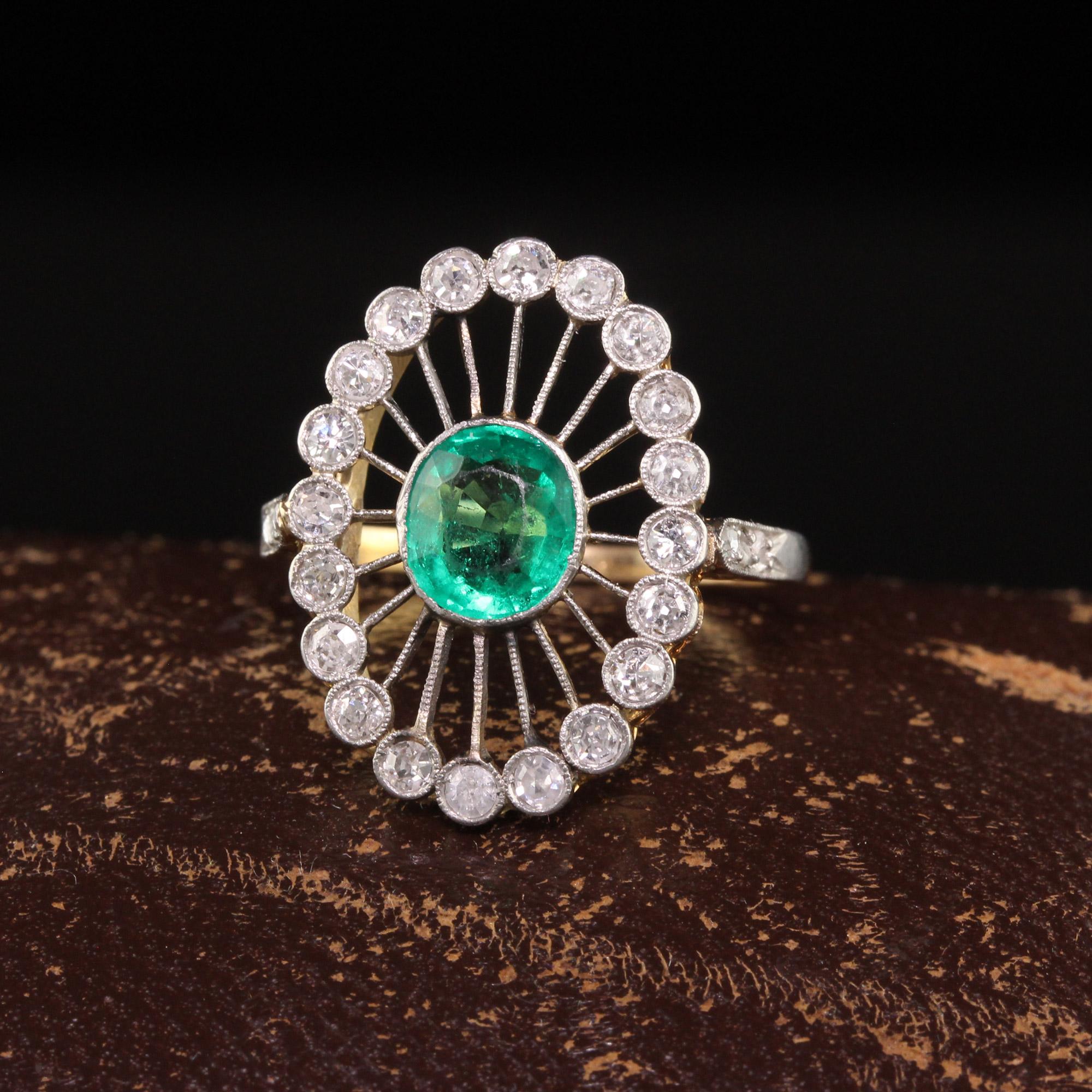 Beautiful Antique Edwardian 18K Yellow Gold Colombian Emerald and Diamond Ring. This gorgeous ring is crafted in 18k yellow gold and platinum top. The center holds a natural Colombian emerald that is surrounded by single cut diamonds in a web