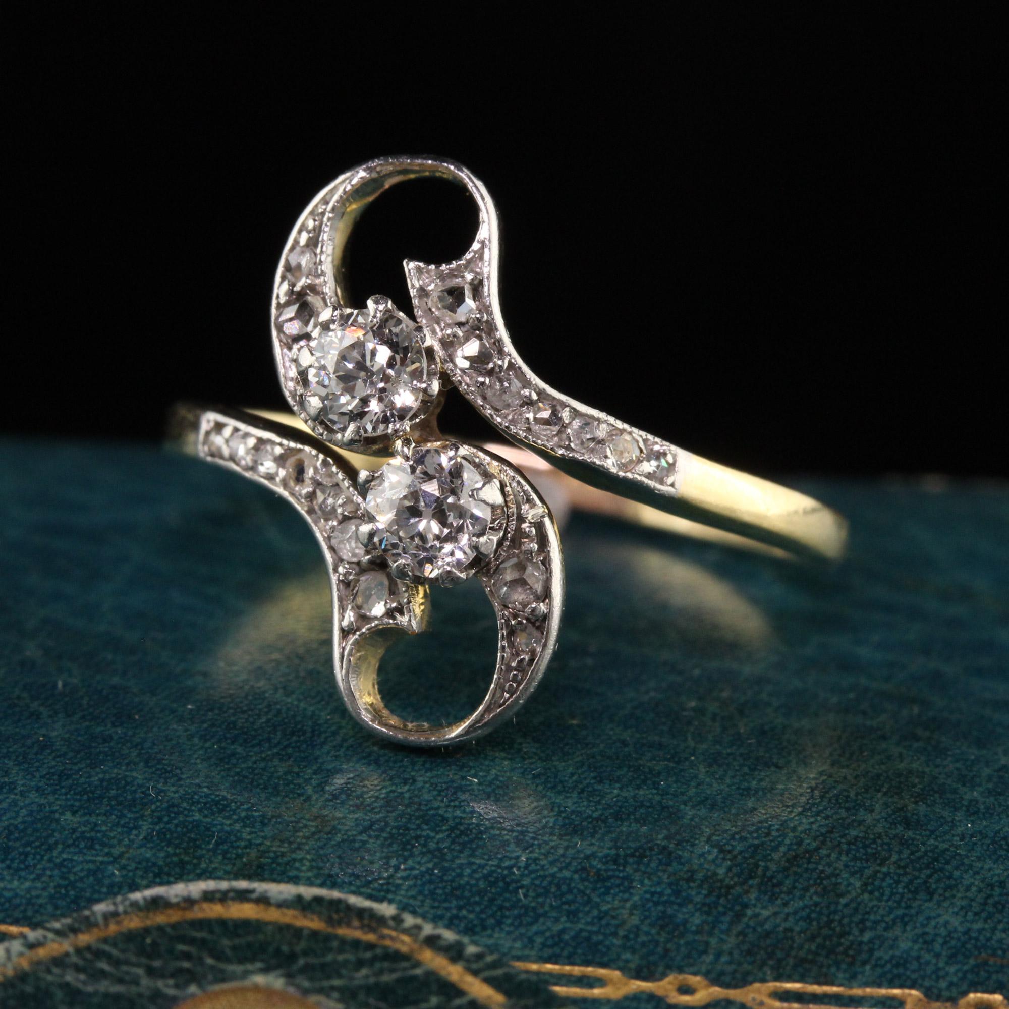 Beautiful Antique Edwardian 18K Yellow Gold Old Mine Rose Cut Diamond Toi et Moi Ring. This gorgeous Edwardian ring is crafted in 18K yellow gold and platinum top. This ring has old mine cuts in the center with rose cuts going down the sides and