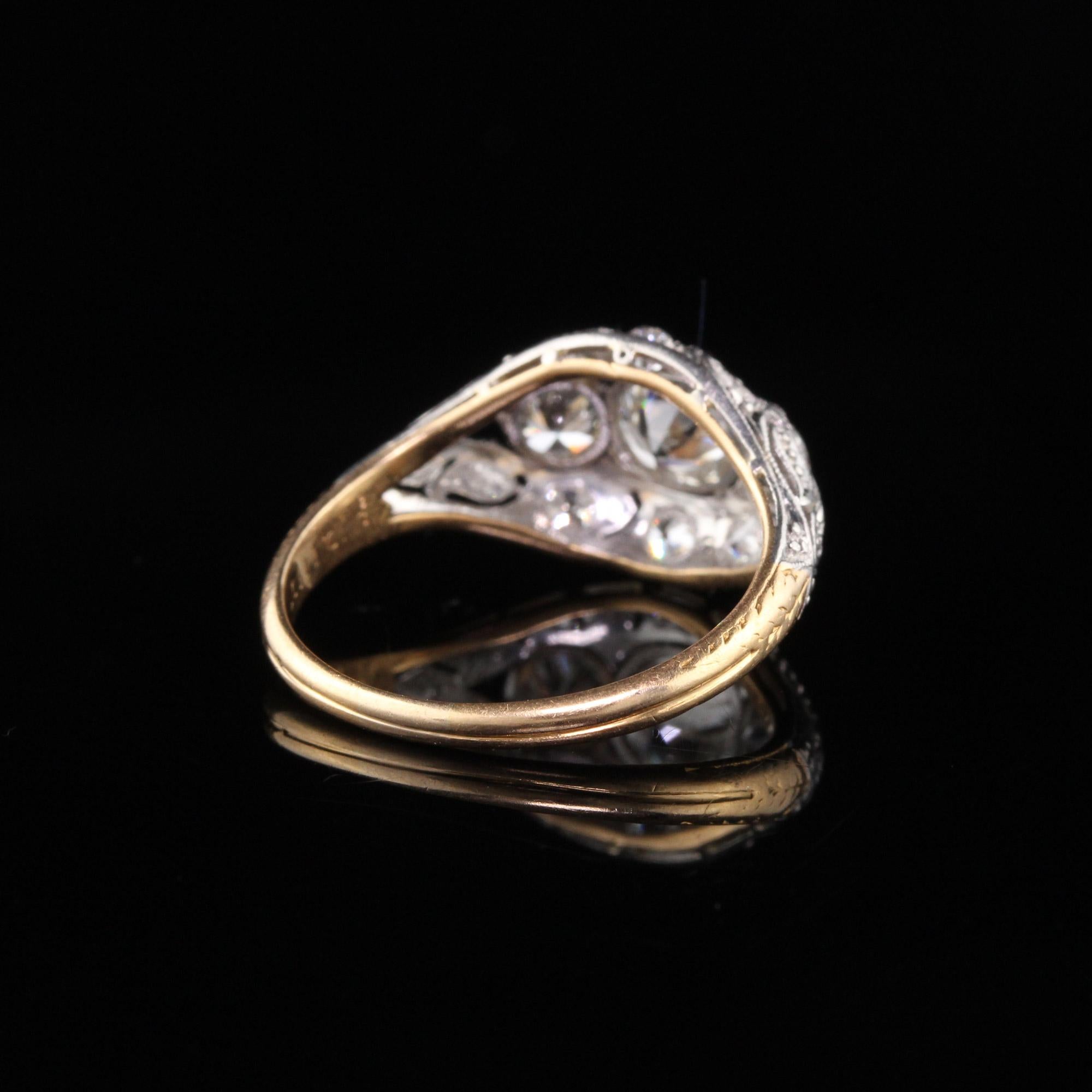 Antique Edwardian 18 Karat Gold and Platinum 3-Stone Diamond Engagement Ring In Excellent Condition In Great Neck, NY