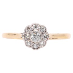 Antiker Ring im edwardianischen Stil aus 18-karätigem Gelbgold und Platin mit Diamanten in Gänseblümchenform