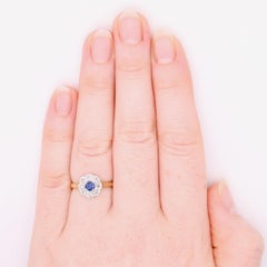 Antiker Ring im edwardianischen Stil aus 18-karätigem Gelbgold und Platin mit Saphiren und Diamanten in Gänseblümchenform