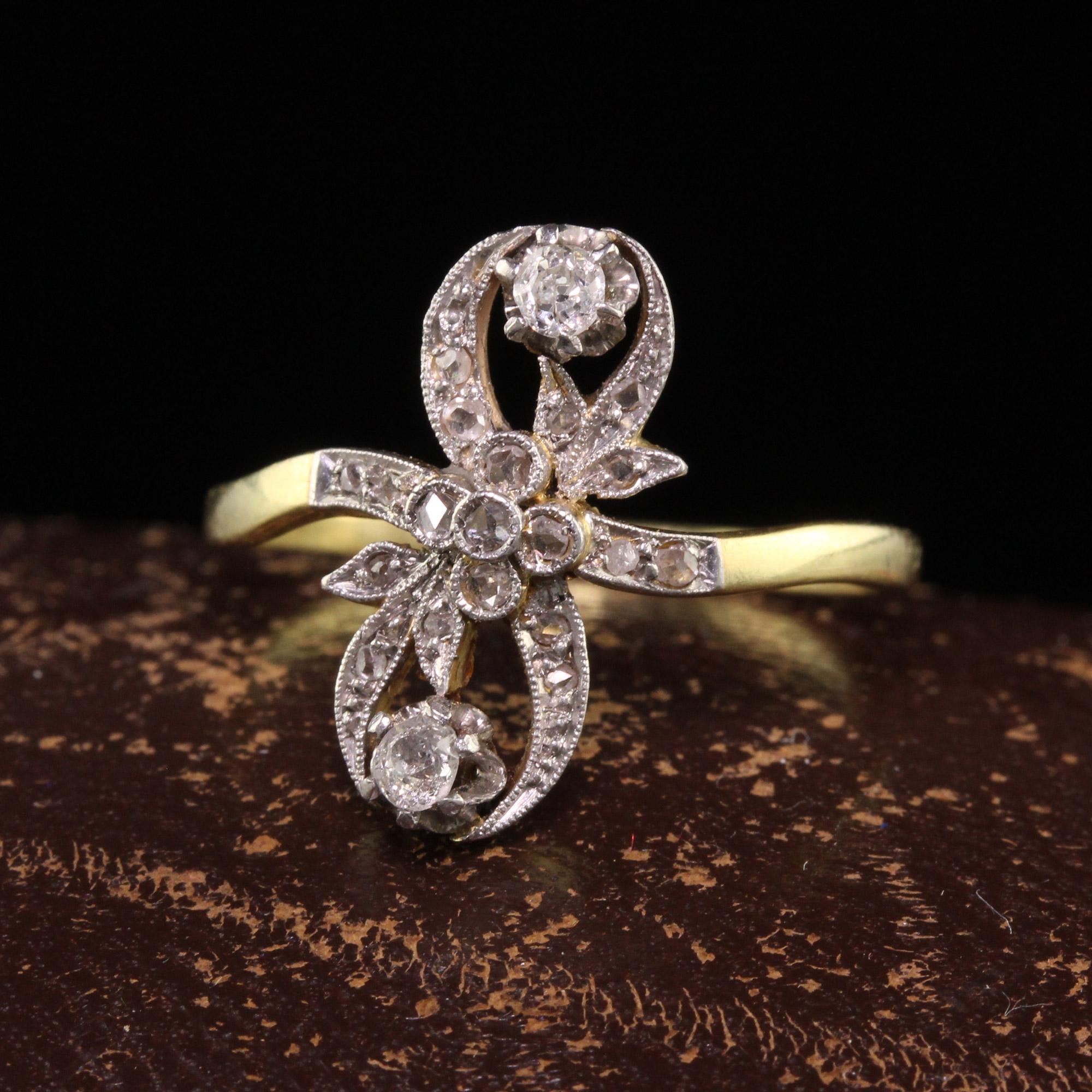 Beautiful Antique Edwardian 18K Yellow Gold Platinum Top Floral Diamond Ring. This gorgeous ring is crafted in 18k yellow gold and platinum top. The top of the ring is covered in rose cut diamonds and two larger old mine cut diamonds. The ring is in