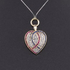 Antique Edwardian 18 Karat Gold, Ruby, Sapphire and Diamond Heart Lock Pendant