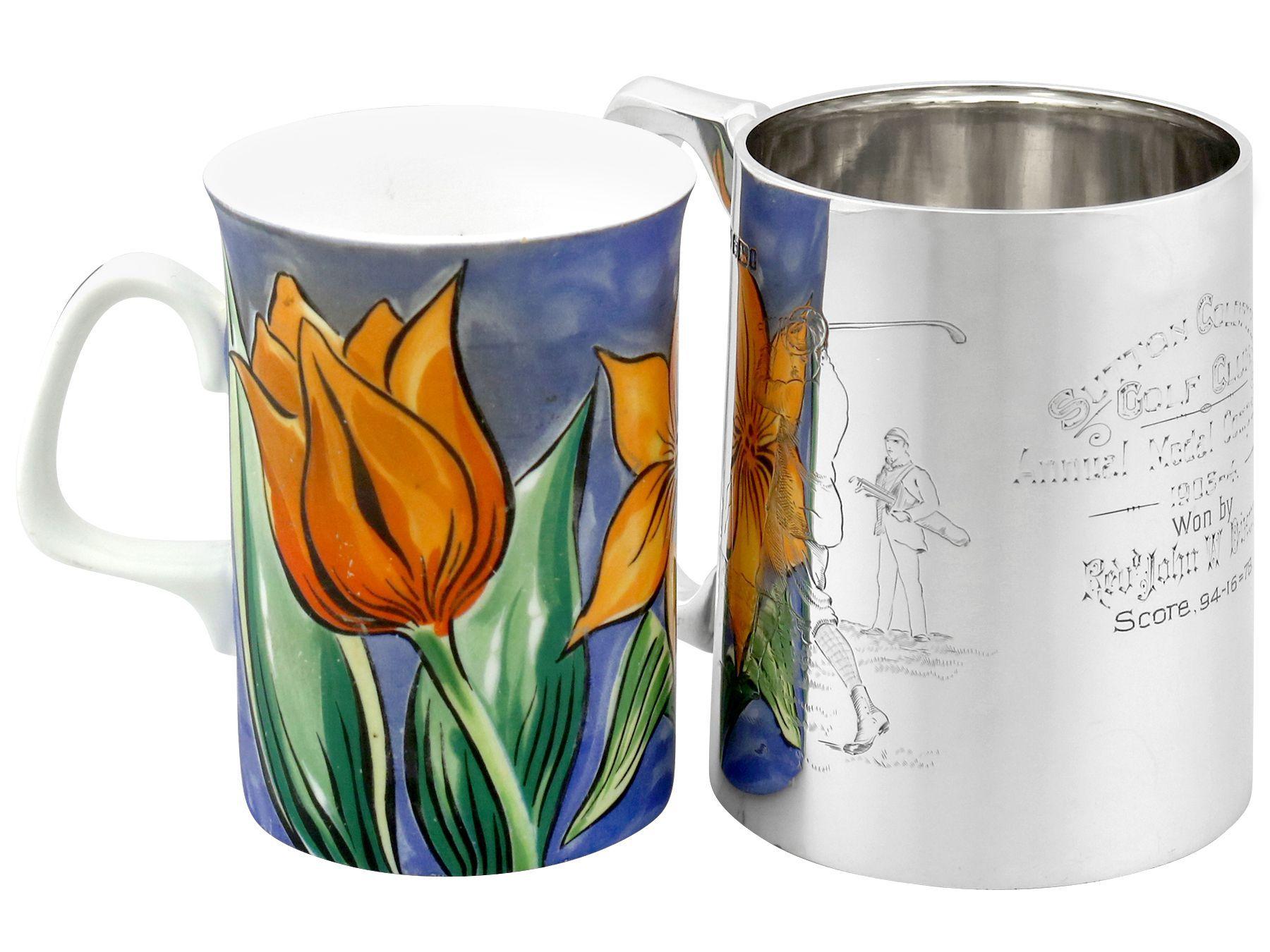 An exceptional, fine and impressive antique Edwardian English sterling silver mug with golf interest; an addition to our silver presentation collection.

This exceptional antique Edwardian sterling silver mug has a subtly tapering cylindrical