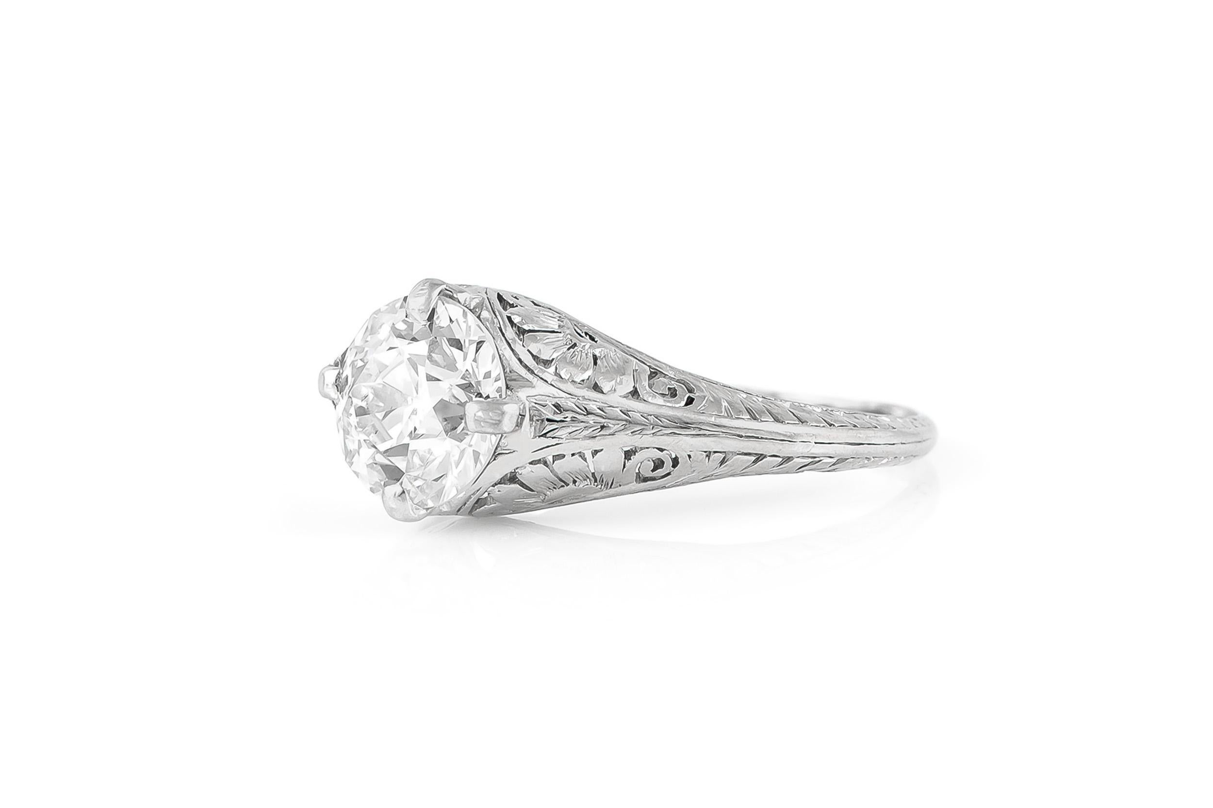 Finely crafted in platinum with filigree detailing and a GIA certified Old European cut Diamond weighing 1.70 carat, J color, SI1 clarity, GIA #6187750774.
Circa 1910s
Size 7 1/4, resizable