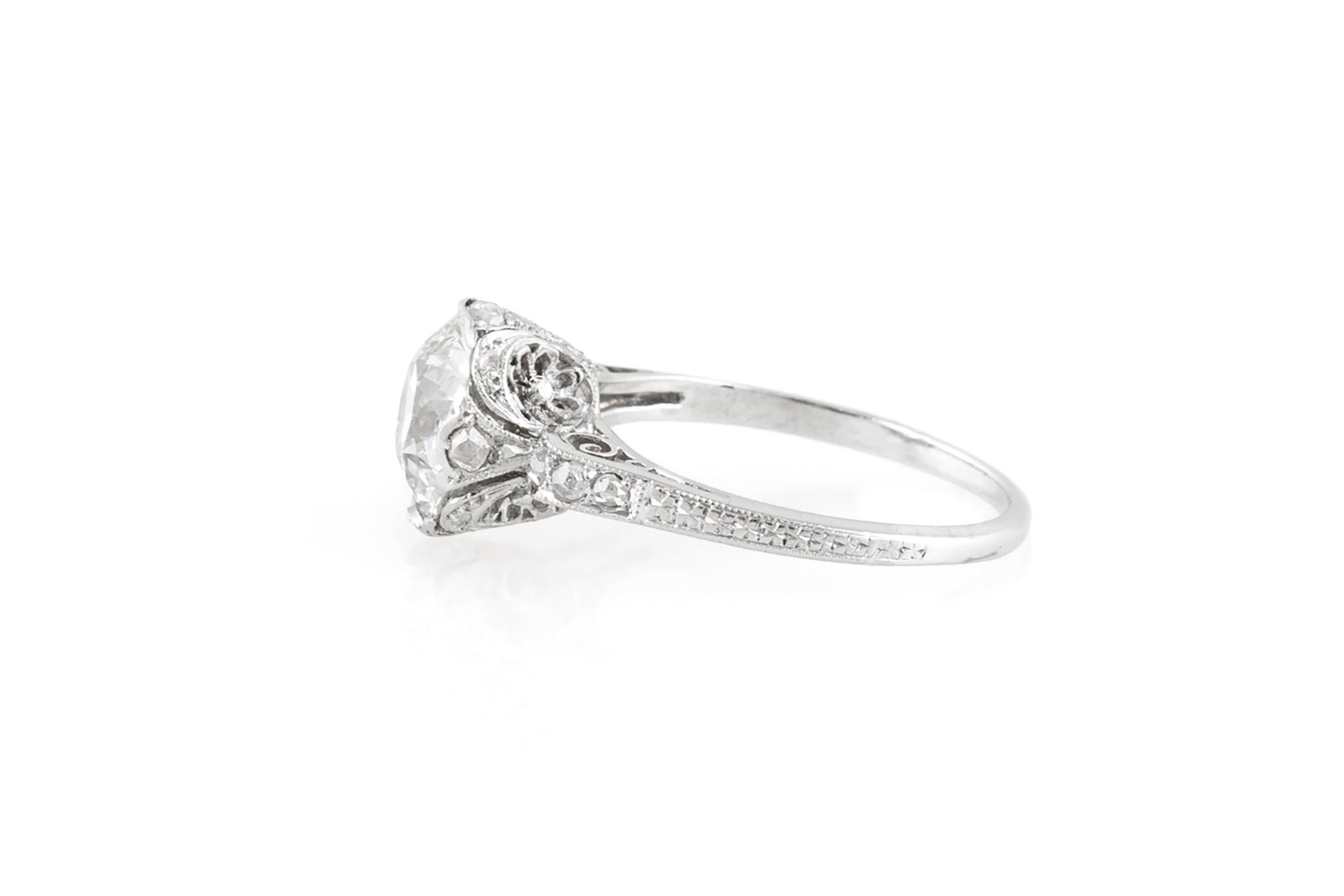 Finely crafted in platinum with a GIA certified Old European cut Diamond at the center weighing 2.17 carats, K color, VS1 clarity, GIA #14591642. 
The ring also features filigree detailing and additional accenting Diamonds along the setting.
Circa