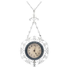 Montre pendentif édouardienne ancienne des années 1910 en émail bleu avec diamants