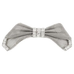 Antique Edwardian 1910s Mesh Platinum Bow Brooch with Diamonds
