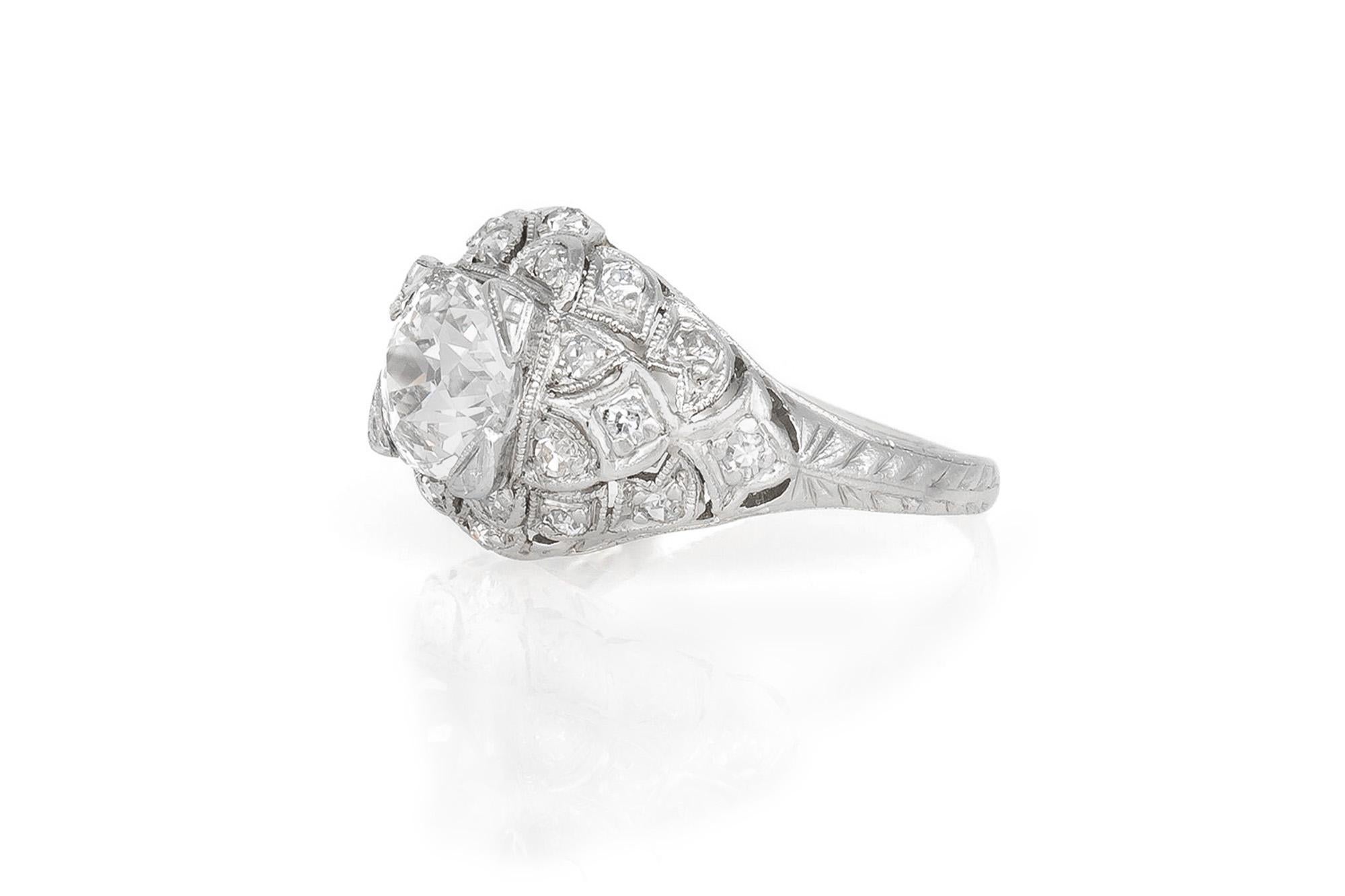 Finely crafted in platinum with an Old Mine cut Diamond weighing approximately 1.25 carats, I-J color, VS2 clarity.
The ring features accenting Single cut Diamonds weighing a total of approximately 0.20 carat.
Circa 1915
Size 5, resizable