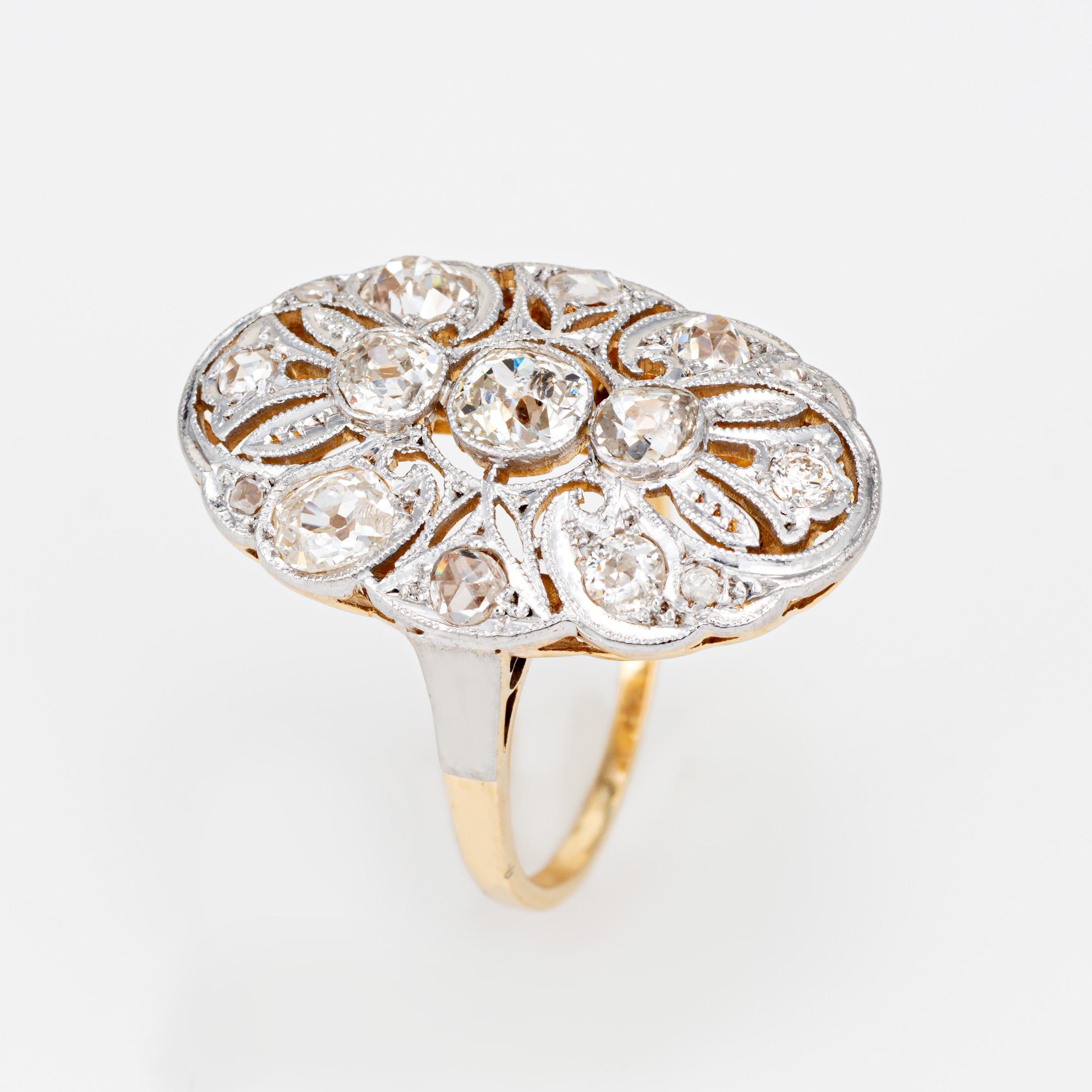 Finely detailed antique Art Nouveau diamond ring (circa 1910s) crafted in 18k yellow gold & 900 platinum. 

Old mine & rose cut diamonds total an estimated at 1 carat (estimated at K-L color and SI2-I2 clarity).   

The beautiful platinum topped