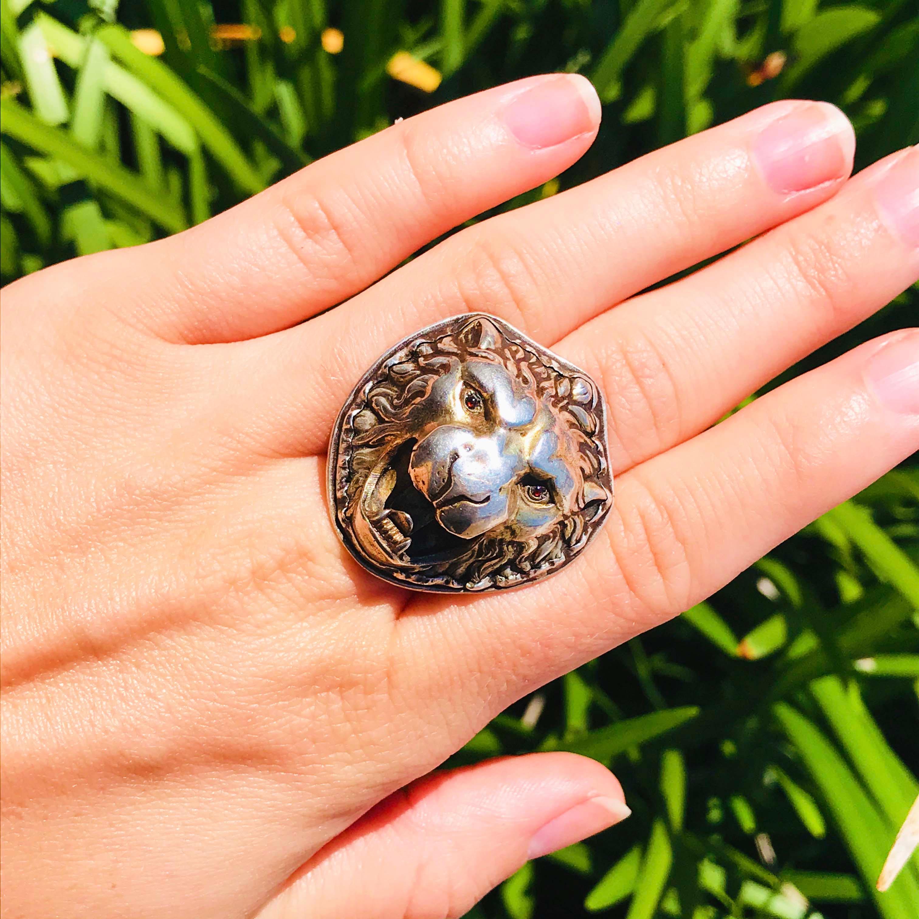 This Victorian/Edwardian Powerful Lion Ring is incredible! The antique sterling lion ring is intricate and detail oriented! The top of the ring has the most gorgeous handmade lion head with ruby eyes. The entire piece has all of the original metal