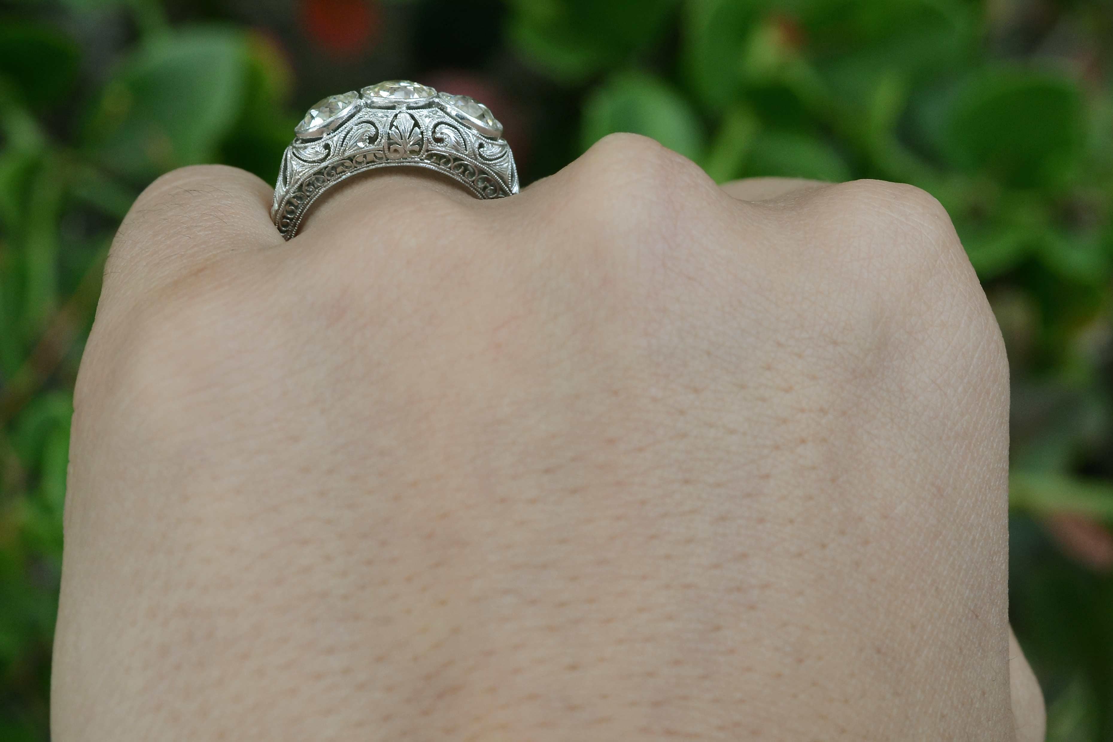 art deco 3 stone diamond ring