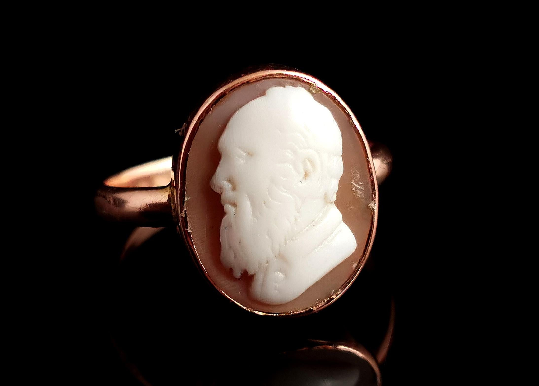 A gorgeous antique, Edwardian era 9kt gold cameo ring.

A handsome carved bullmouth shell cameo with a portrait of a bearded gentleman, an intricate and detailed carving.

It is set into a rich 9kt yellow gold bezel frame with a smooth 9kt gold band