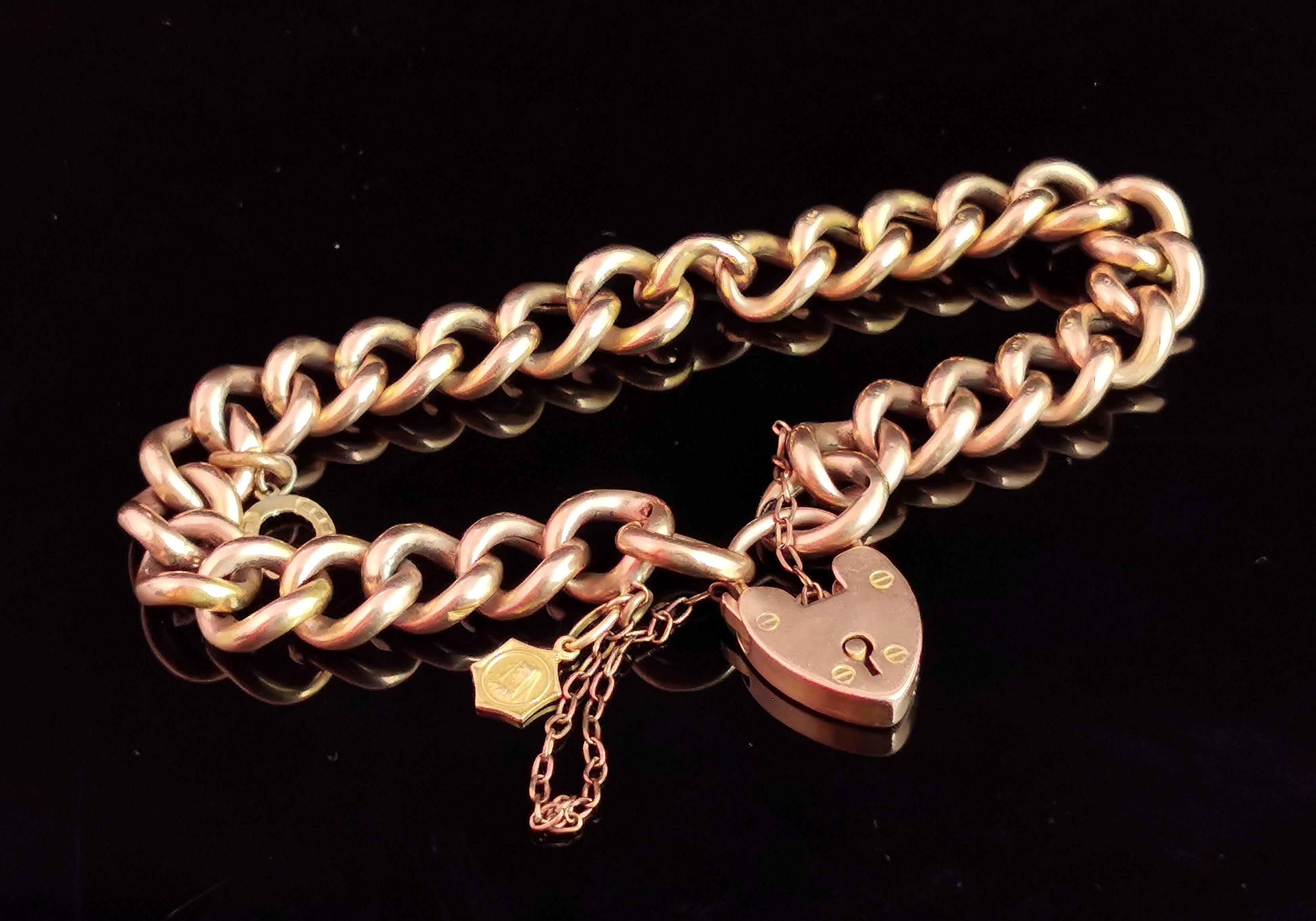 A beautiful antique, Edwardian era 9 karat gold curb link bracelet.

Rich gold hollow curb links, each individually stamped 9c.

They are joined by an antique 9 karat gold heart shaped padlock clasp which is fully hallmarked for Birmingham, 1904,