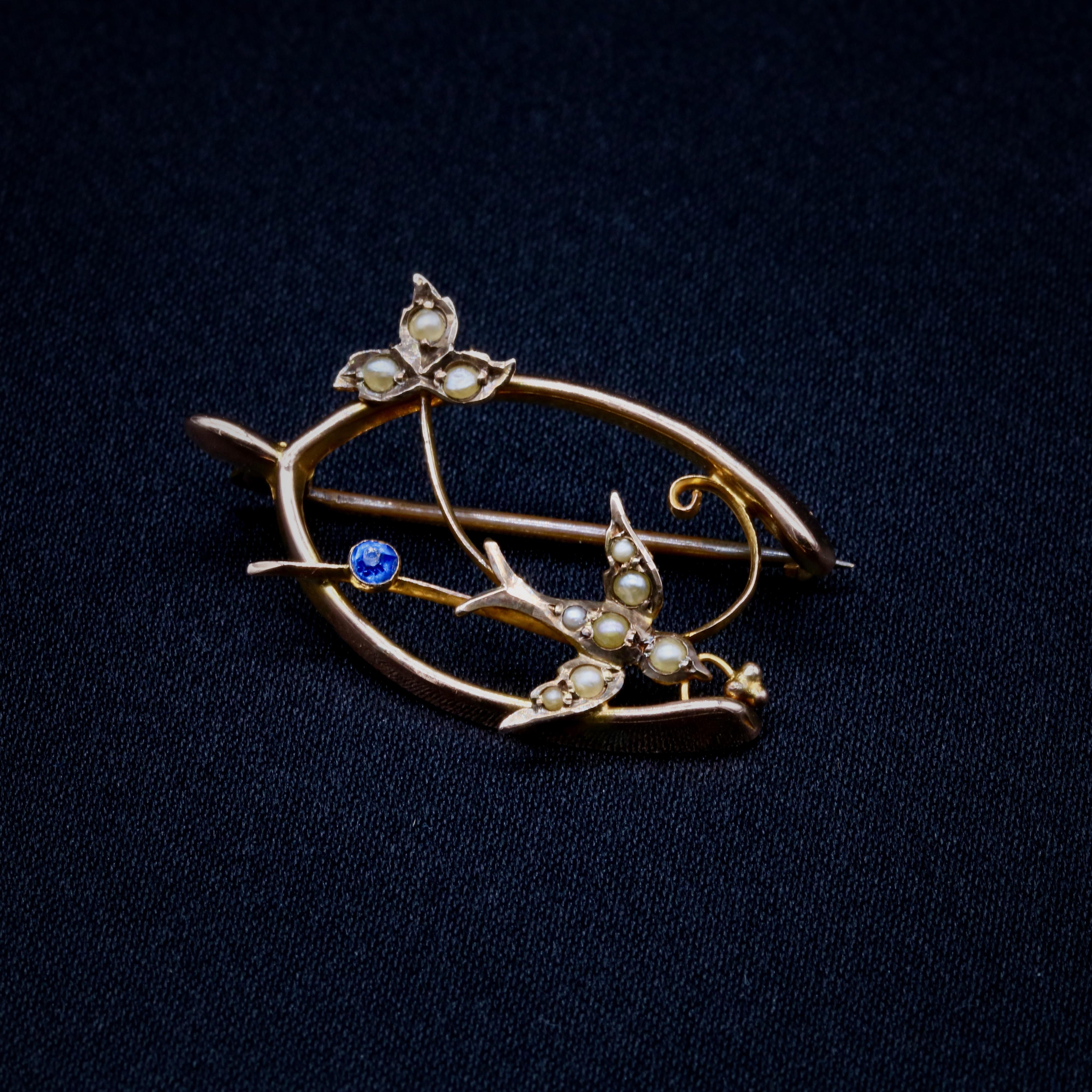 Round Cut Antique Edwardian 9K Yellow Gold Blue Paste and Pearl Swallow Wishbone Brooch For Sale