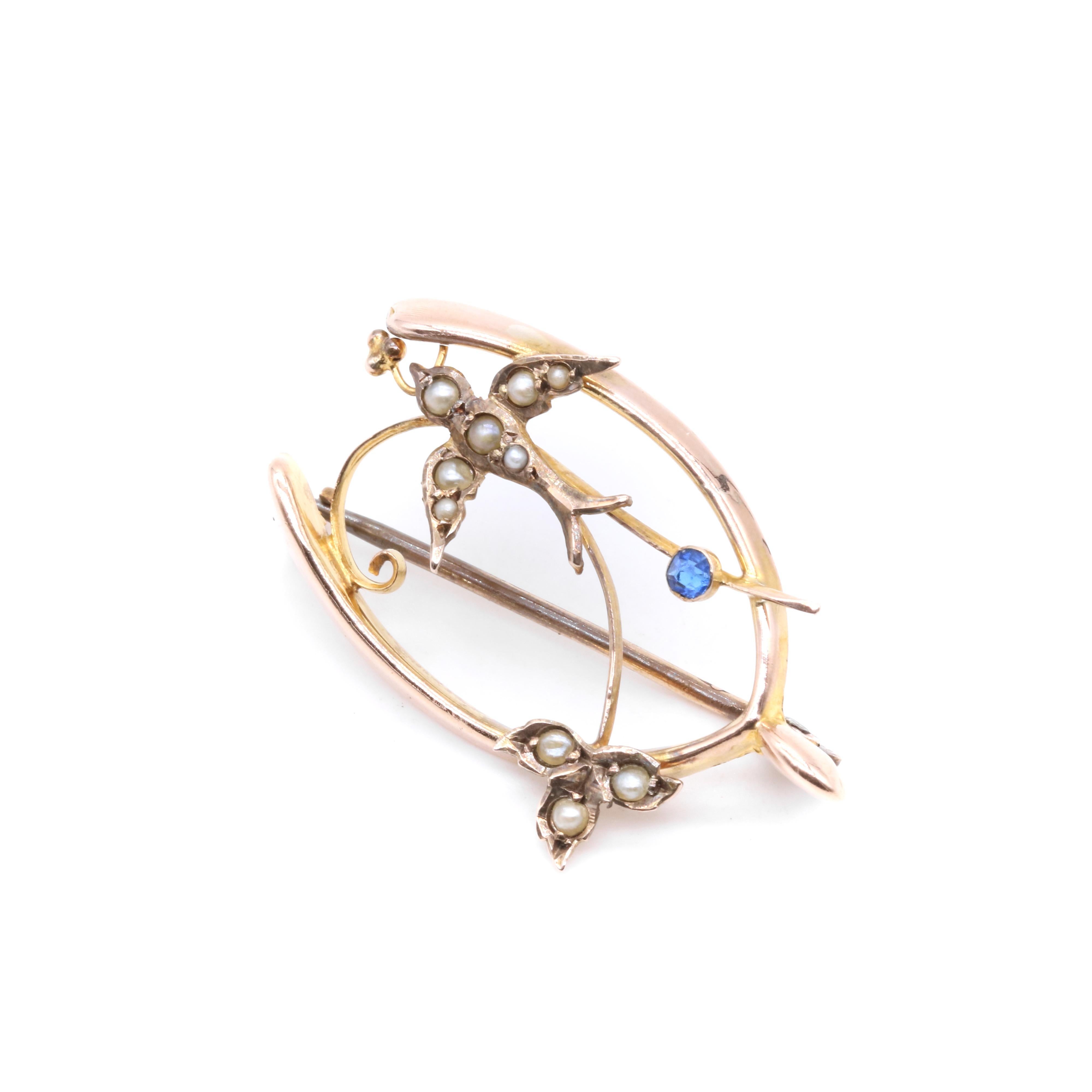 Antique Edwardian 9K Yellow Gold Blue Paste and Pearl Swallow Wishbone Brooch For Sale 1