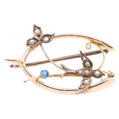 Antique Edwardian 9K Yellow Gold Blue Paste and Pearl Swallow Wishbone Brooch