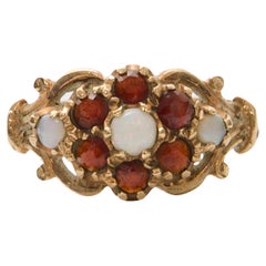 Antique Edwardian 9K Yellow Gold Opal and Garnet Halo Ring