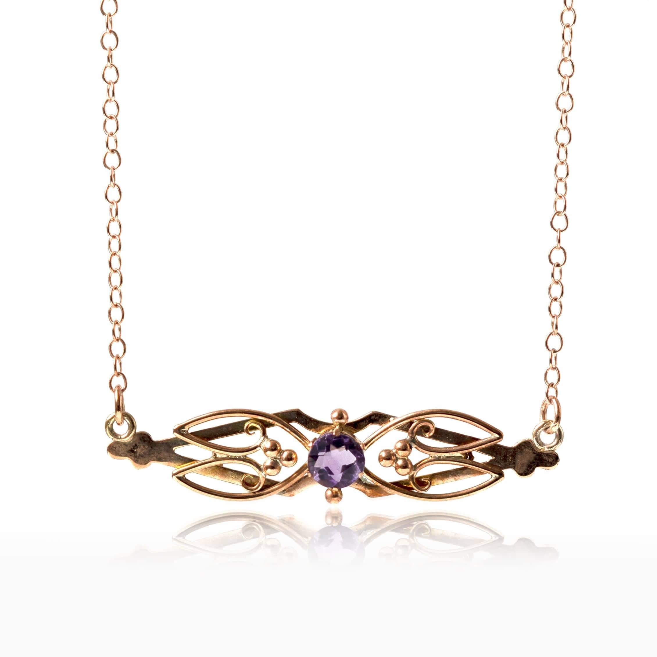 Legend has it Amethyst will keep the wearer clear-headed and quick witted in battle and in business affairs.

Our early 20th century pendant features a single solitaire diamond set in 15ct rose gold. The piece was converted from a brooch into a