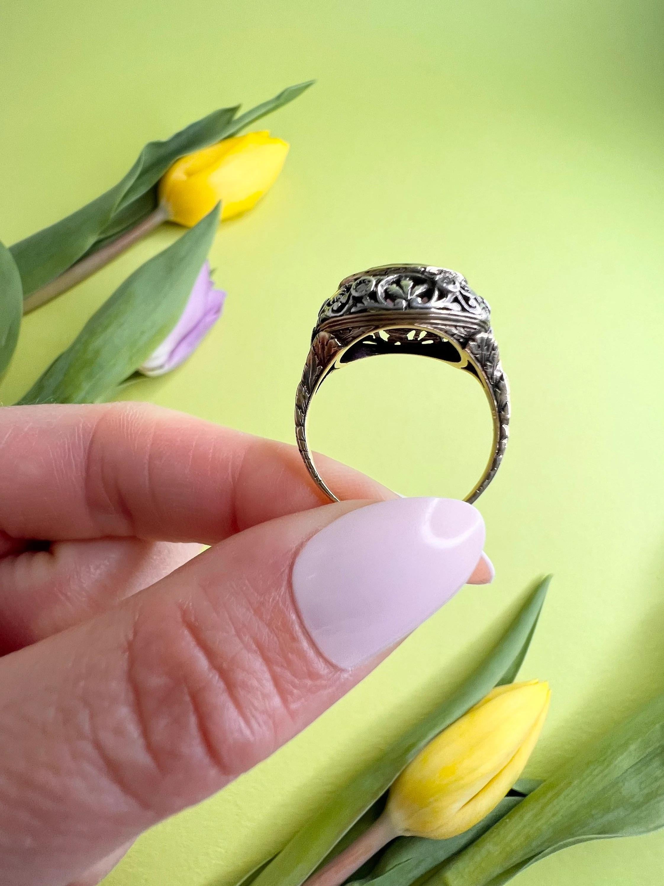 Antique Amethyst Ring

18ct Yellow & White Gold 

Circa 1910

Fabulous Faceted Oval Amethyst & Diamond Ring. Set in Both Yellow & White Gold with the Most Beautiful, Floral Filigree Detail. 


Face of the ring measures approx:
Height 14mm
Width