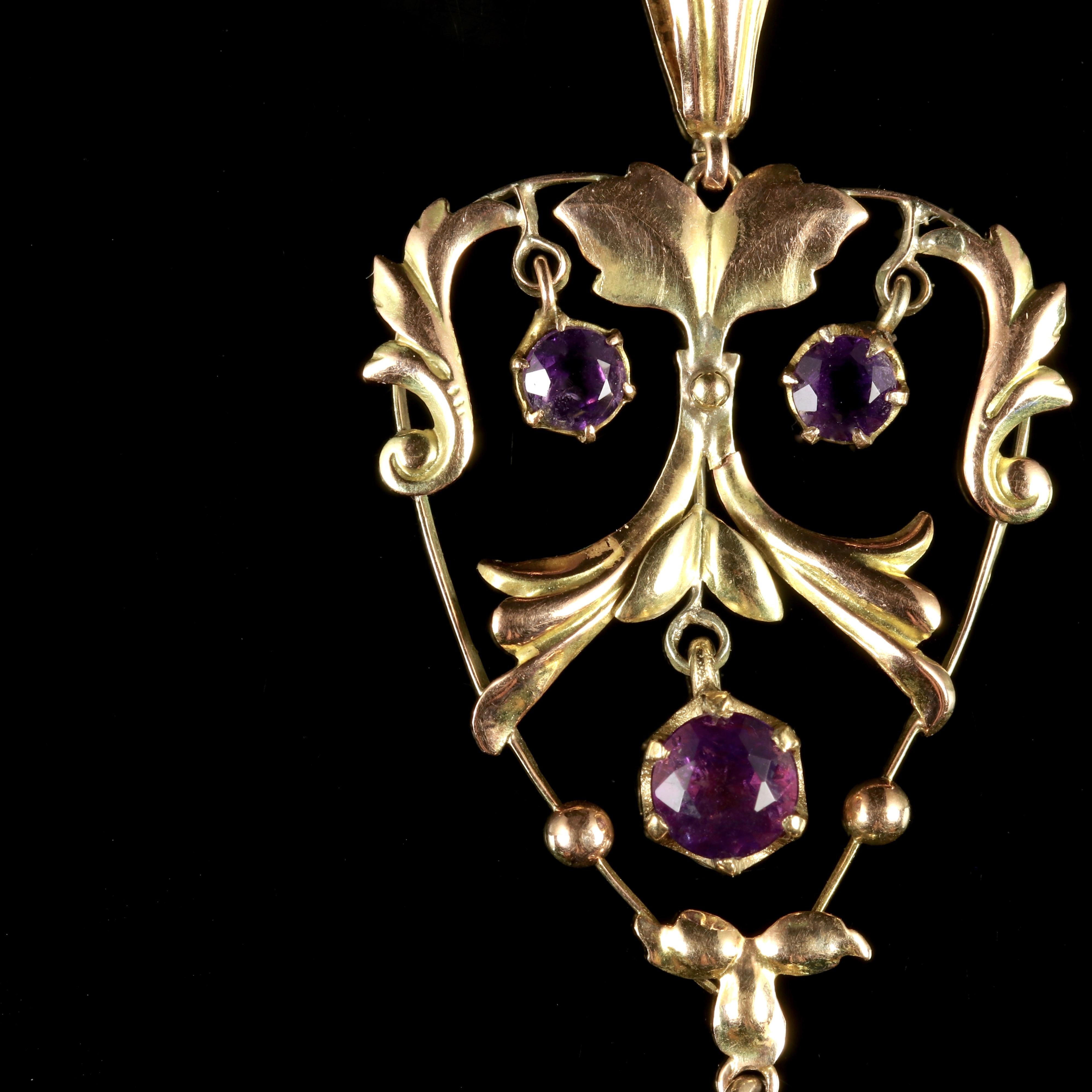 This beautiful Edwardian 9ct Yellow Gold pendant is Circa 1910.

The pendant boasts a pendulum of rich, purple Amethysts in a floral like gallery.

Three Amethysts cascade from the pendant.

The Pearl dropper has a lustrous sheen with a creamy