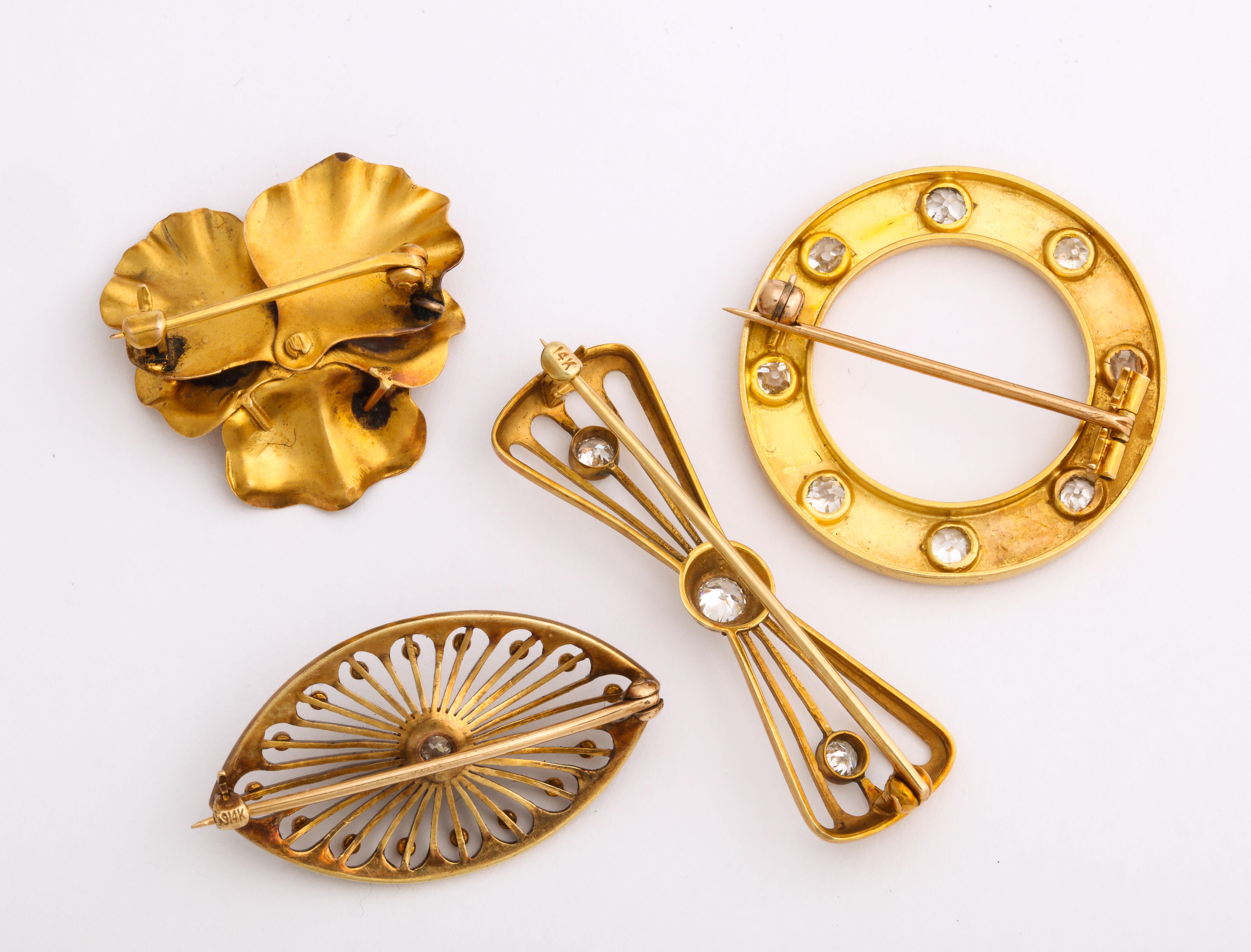A treasured collection of fine antique gold pins with diamonds can be purchased as a collection or separately.  Imagine all or a few on a lapel, running up your sleeve  or encircling a neckline. 
The pansy has sold. 
The circle pin is Victorian c.