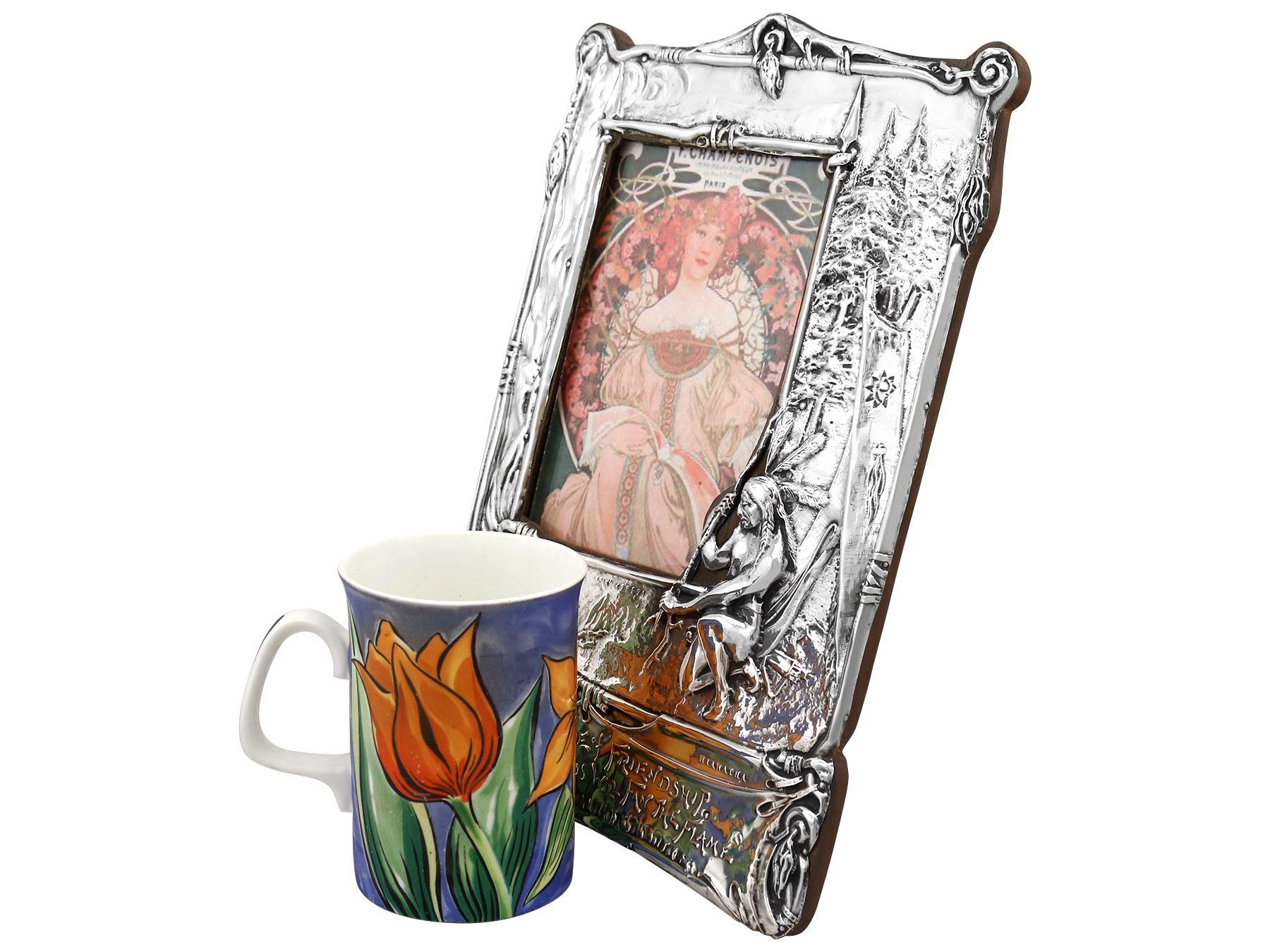 An exceptional, fine and impressive antique Edwardian English sterling silver photograph frame in the Art Nouveau style; an addition to our silverware collection

This exceptional, fine and impressive antique Edwardian sterling silver photograph