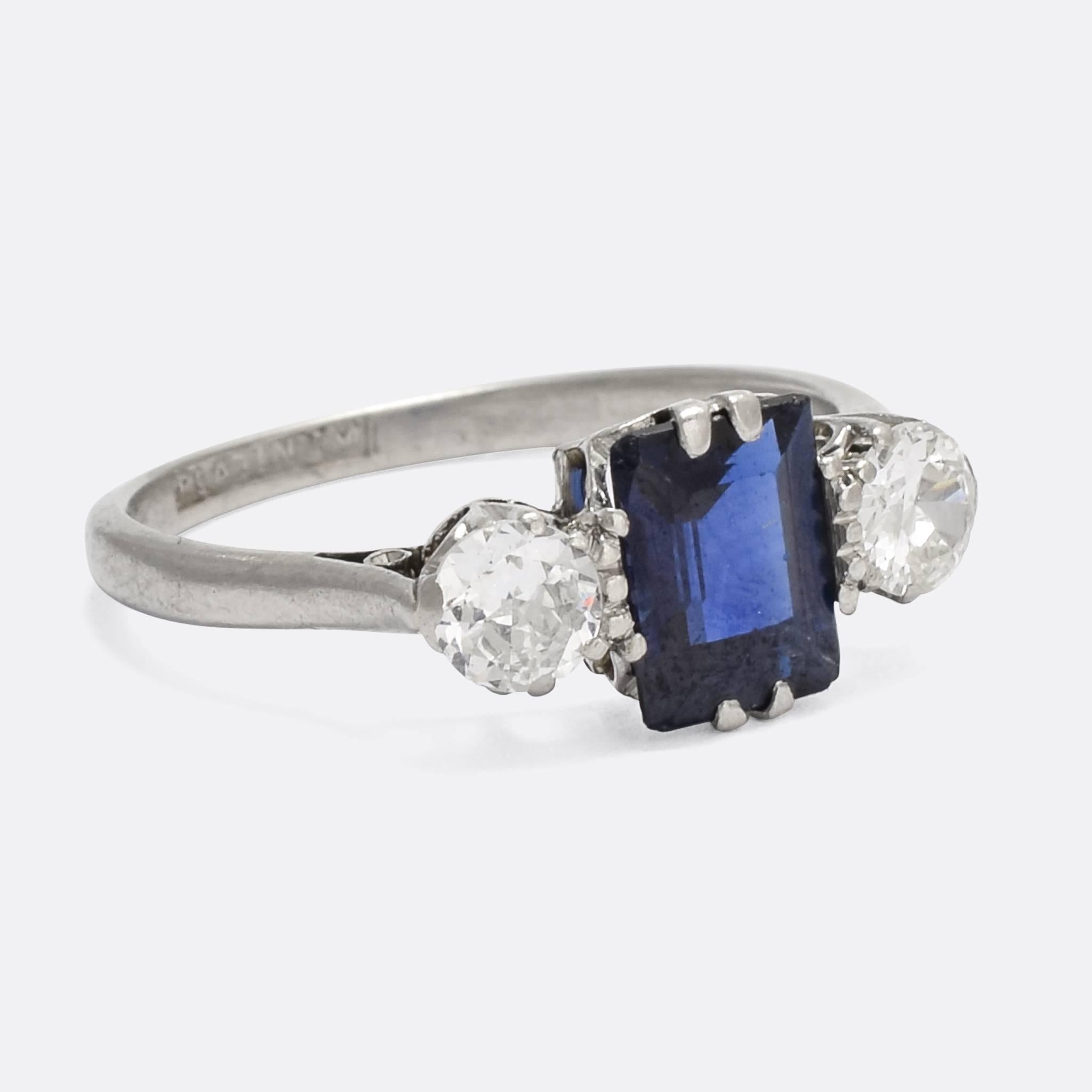 A superb antique sapphire and diamond trilogy ring. The main stone is a vibrant, emerald cut blue sapphire, flanked by two bright transitional cut diamonds. It's modelled in platinum throughout, and dates from circa 1910.

The three stones of a