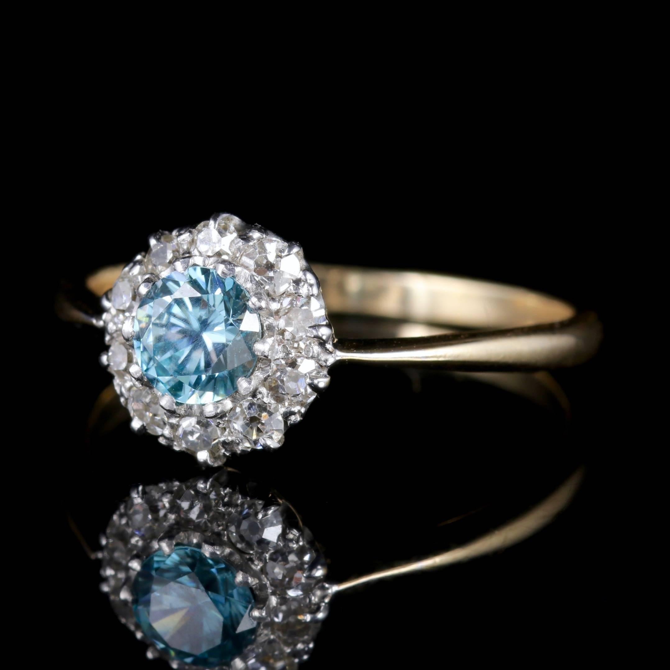 This wonderful antique Blue Zircon and Diamond cluster ring is Edwardian Circa 1915.

The Blue Zircon is approx. 60 points surrounded by Old Cut Diamonds which are SI 1 H Clarity.

In the middle ages the Blue Zircon was said to bring prosperity and