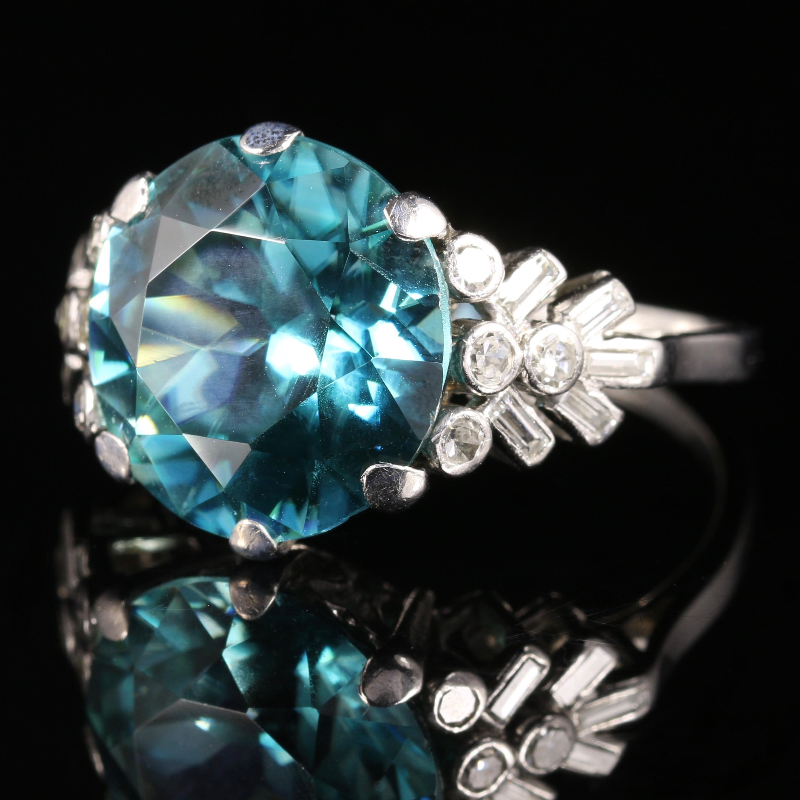 For more details please click continue reading down below...

This fabulous Antique Edwardian Blue Zircon ring is all set in Platinum, Circa 1915.

Set with a lovely large 8ct Blue Zircon, flanked with 9 old cut Diamonds and baguette cut Diamonds on