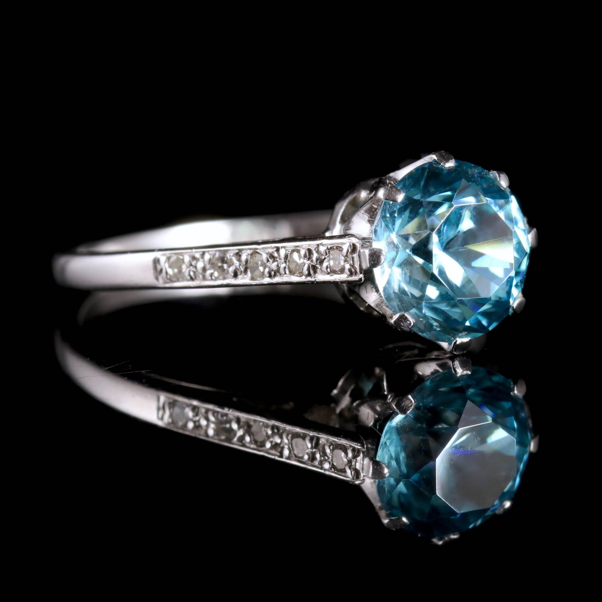 This beautiful Edwardian 18ct White Gold ring is set with blue Zircon, Circa 1915.

The blue Zircon is 1.70ct, with Diamonds that chase down each shoulder.

Blue Zircon is the birthstone for December In the middle ages Zircon was said to aid sleep,
