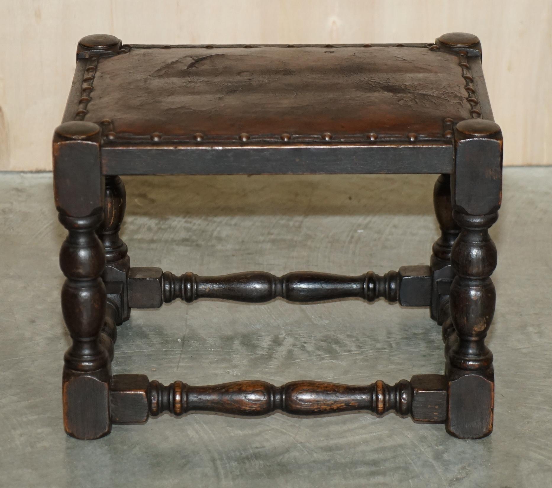 We are delighted to offer for sale this nice original hand made in England oak & leather footstool

A good looking and functional small footstool, the ideal size for one person to go with a club armchair

The condition is period, the upholstery