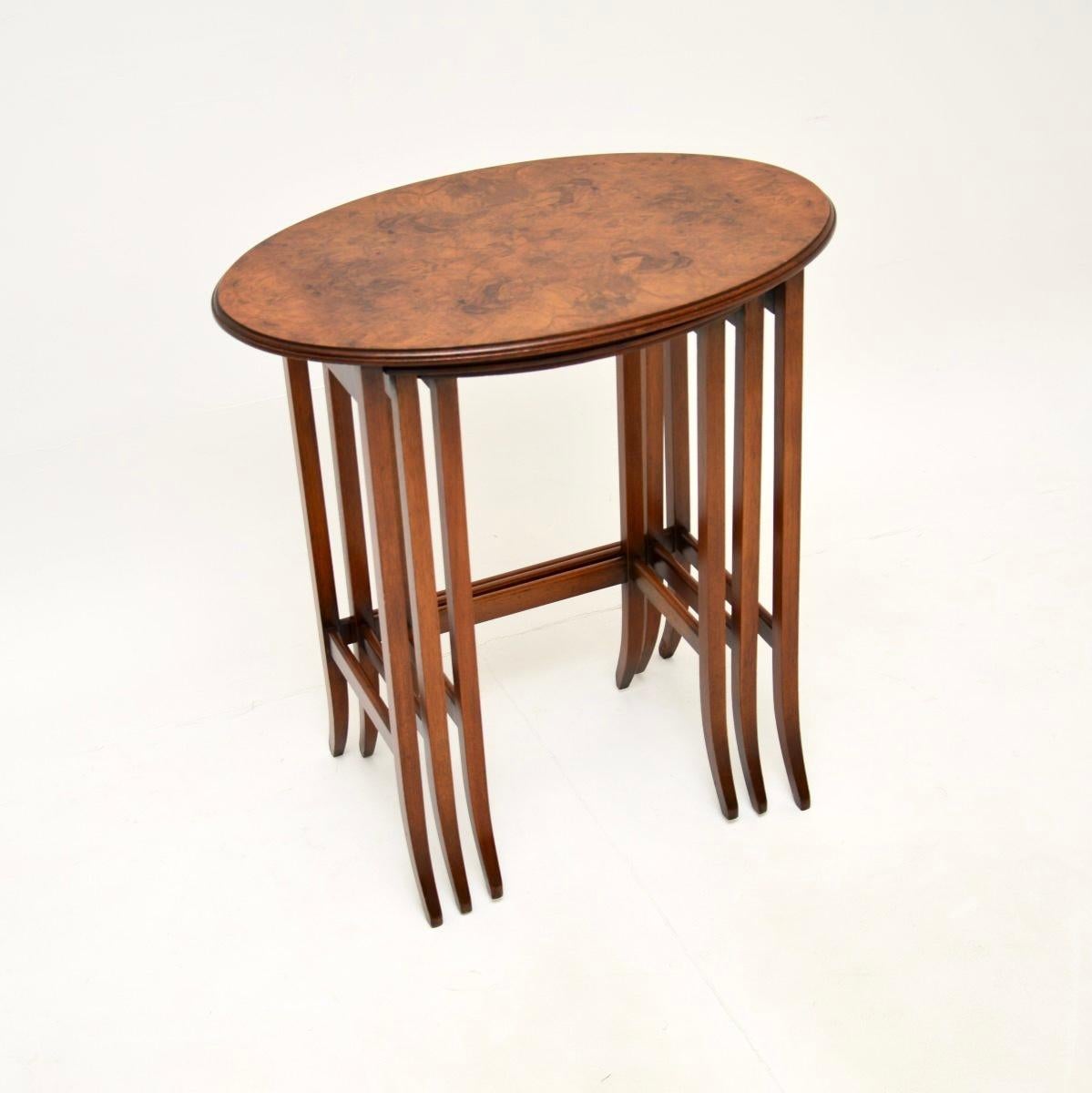 A smart and very well made antique Edwardian burr walnut nest of three tables. This was made in England, it dates from around the 1900-1910 period.

It is of lovely quality, the burr walnut tops have stunning grain patterns and a gorgeous colour