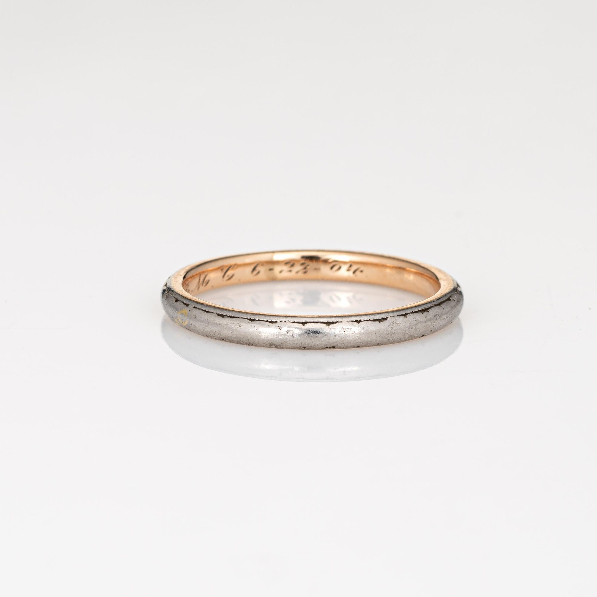 Elegant antique Edwardian wedding band (circa 1904) crafted in 14k yellow gold and platinum. 

The ring epitomizes vintage charm and would make a lovely wedding band. Also great worn alone or stacked with your jewelry from any era. The inner band is