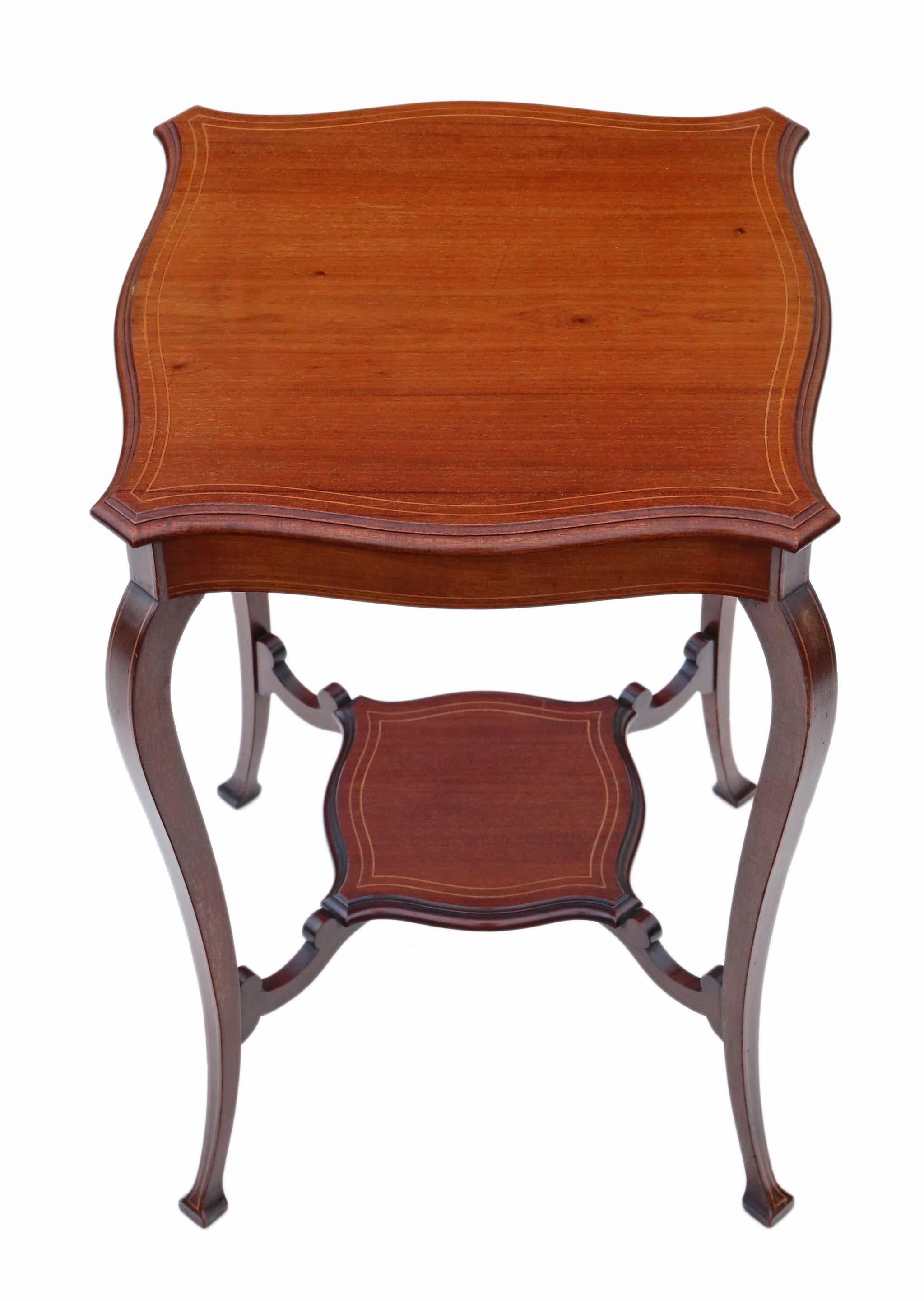 Antique fine quality Edwardian C1905 inlaid mahogany shaped table occasional side centre window.

No loose joints and no woodworm. An abundance of character and charm. A rare decorative find.

Would look great in the right location!

Overall