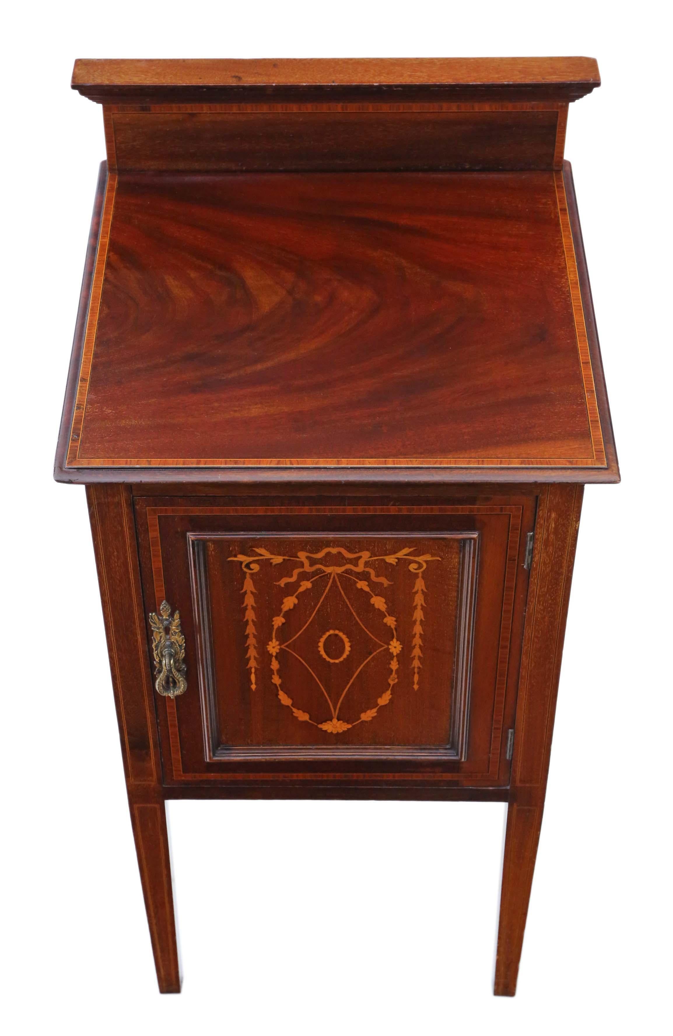 Antique quality Edwardian C1910 inlaid mahogany bedside table or cupboard.

No loose joints and no woodworm. Full of age, character and charm.

Would look great in the right location!

Overall maximum dimensions: 42cm W x 41cm D x 75cm H (plus